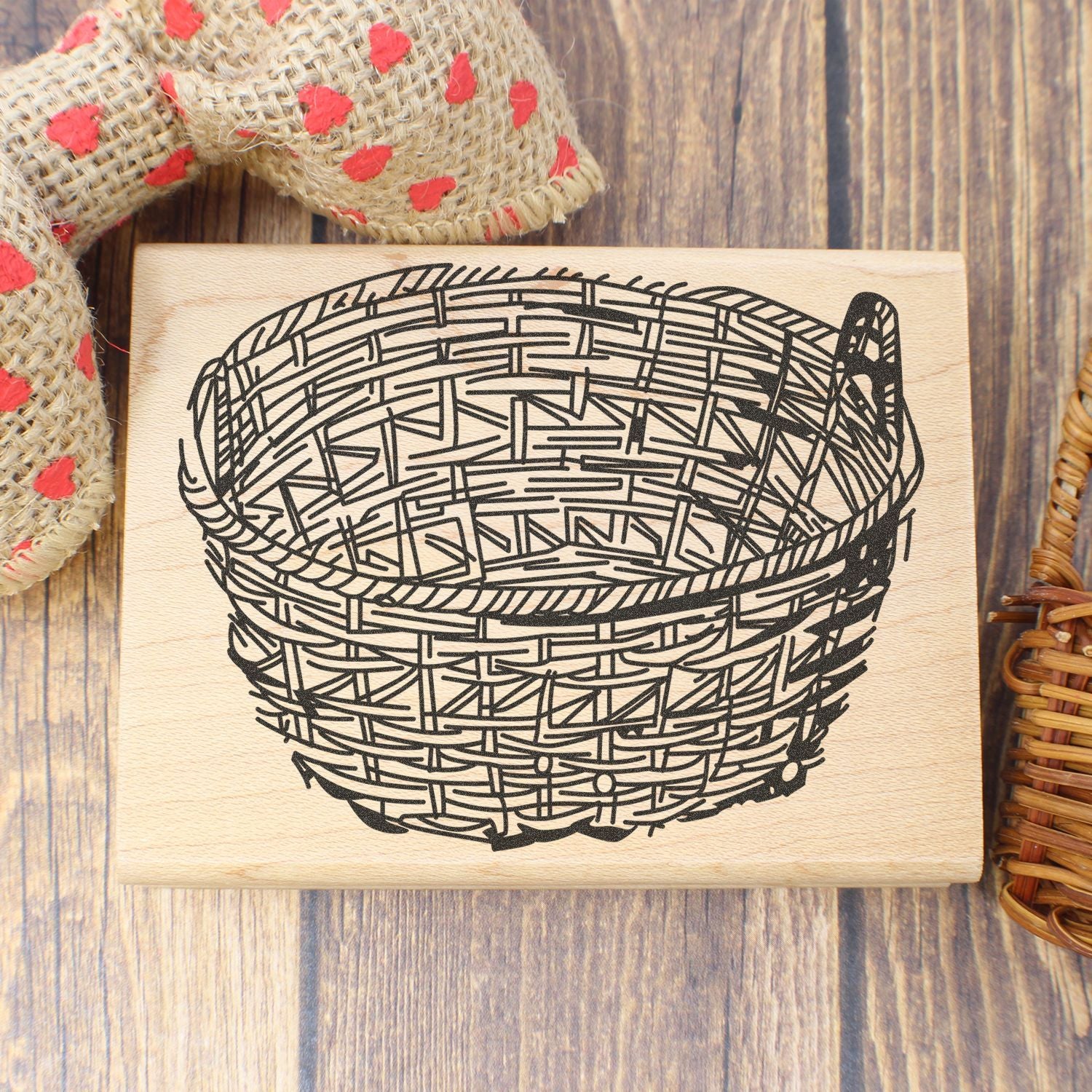 Rustic wooden basket stamp with woven basket illustration on a farmhouse-style wooden background