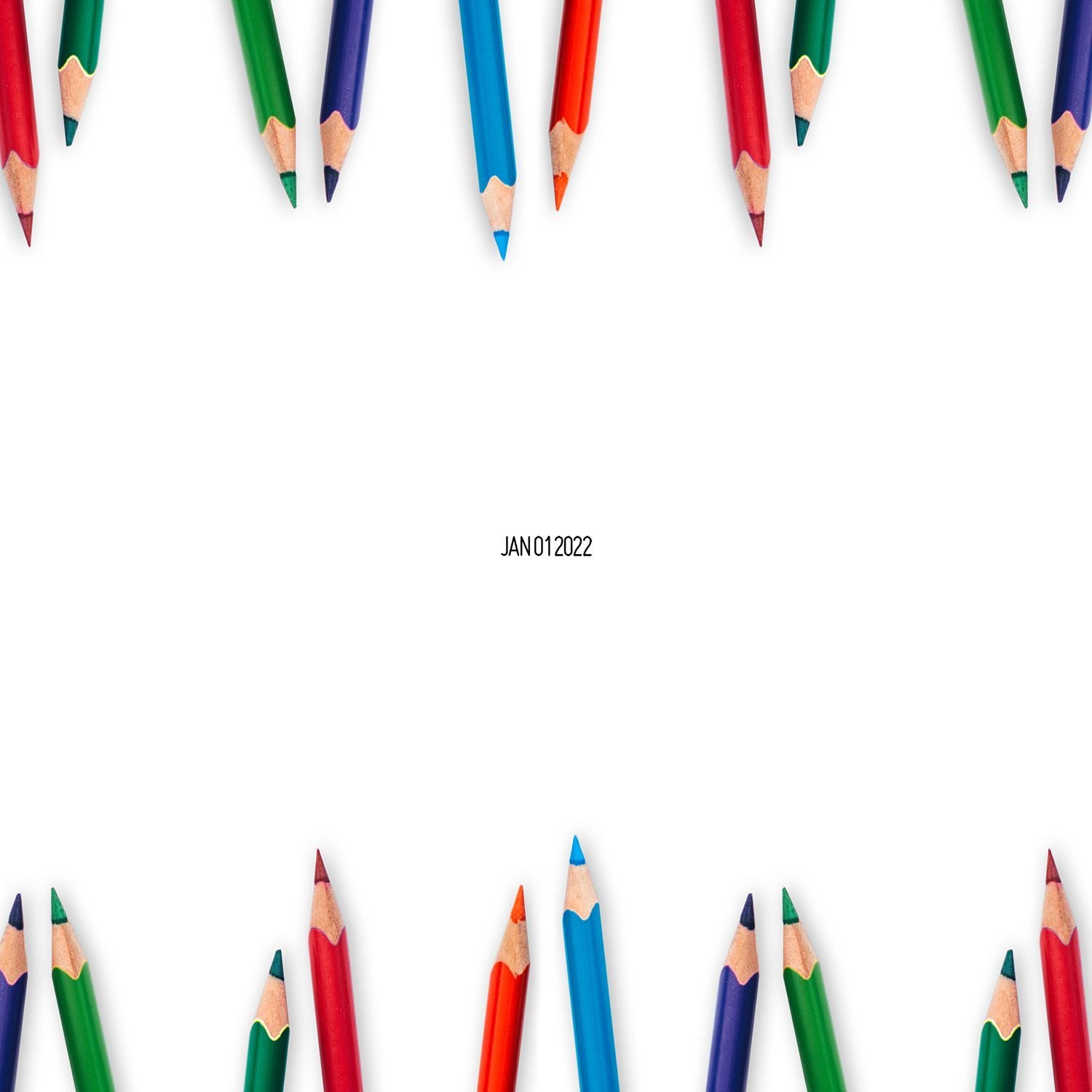 Colorful colored pencils framing blank white space with date text JAN012022 on a white background.