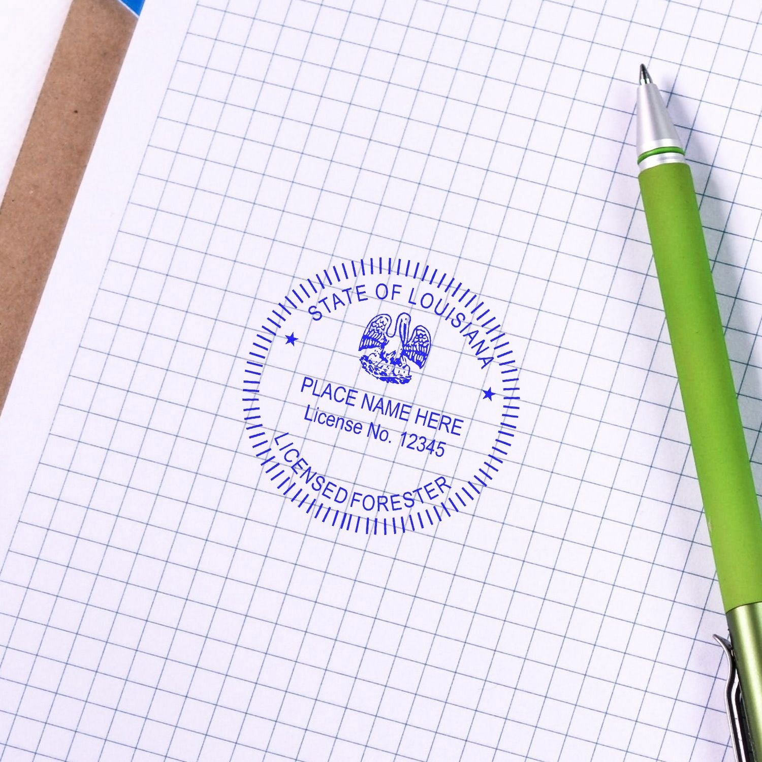 Green pen on graph paper with a Louisiana state forester license stamp on clipboard.