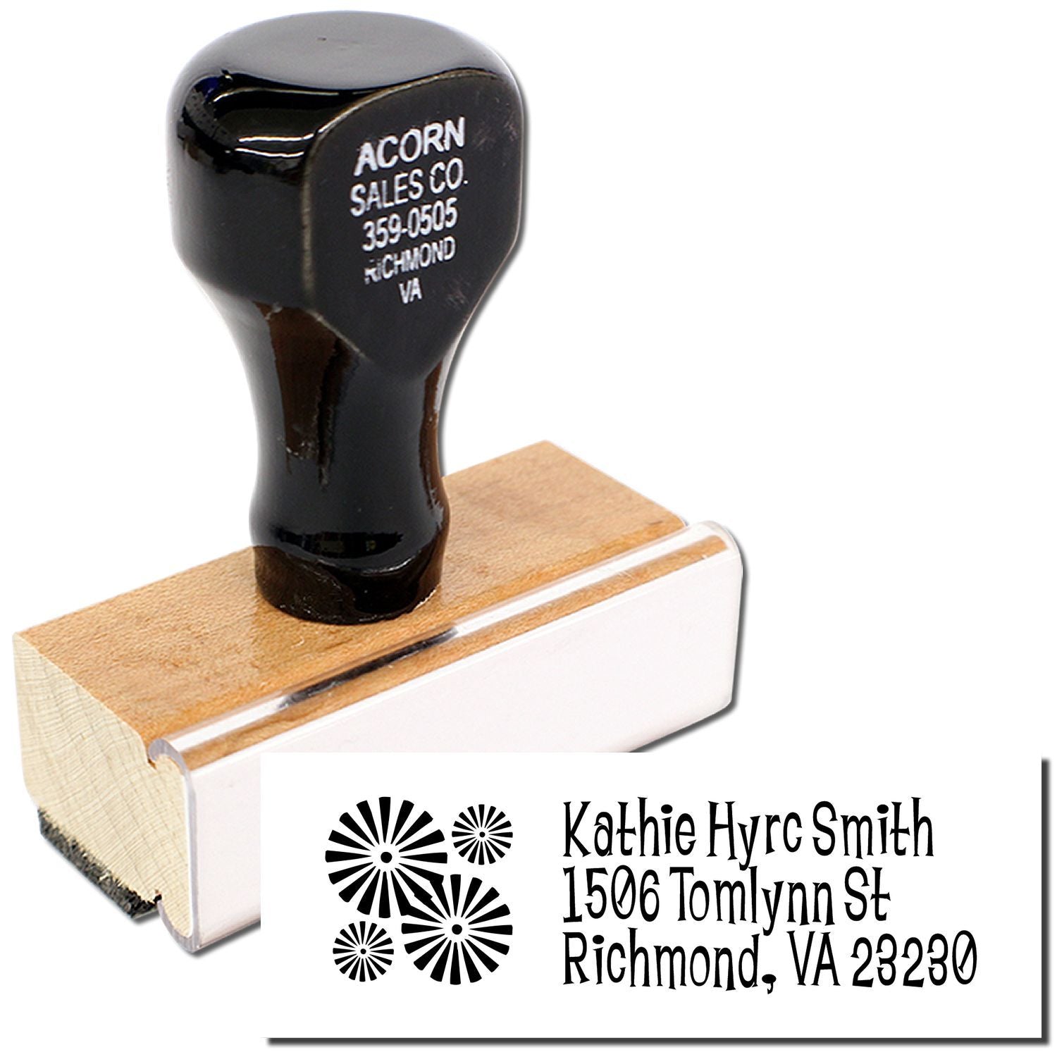 Custom address rubber stamp with wooden handle, showing a personalized name and return address imprint.