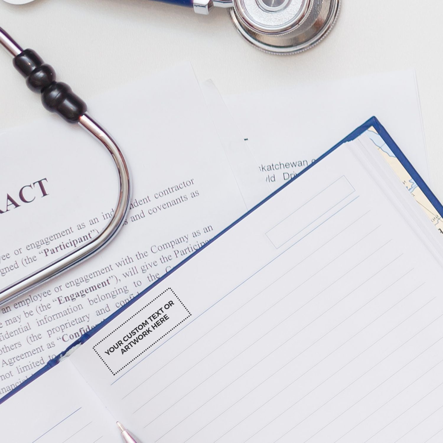 Employment contract agreement with pen and stethoscope on legal document, highlighting review and signature readiness.