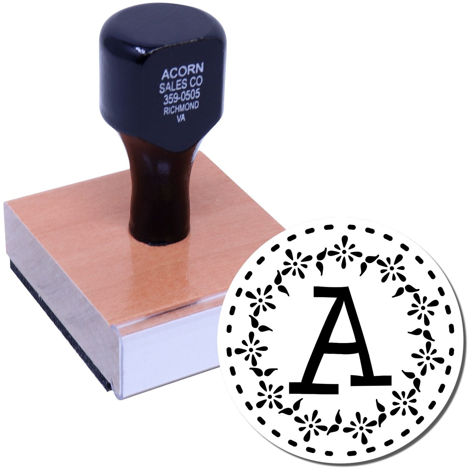 Custom rubber stamp with decorative monogram A design for personalized stationery, invitations, and branding.