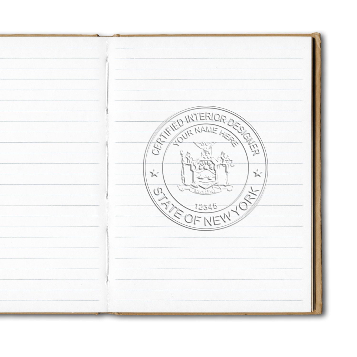Open lined notebook with embossed Certified Interior Designer State of New York seal on blank page.