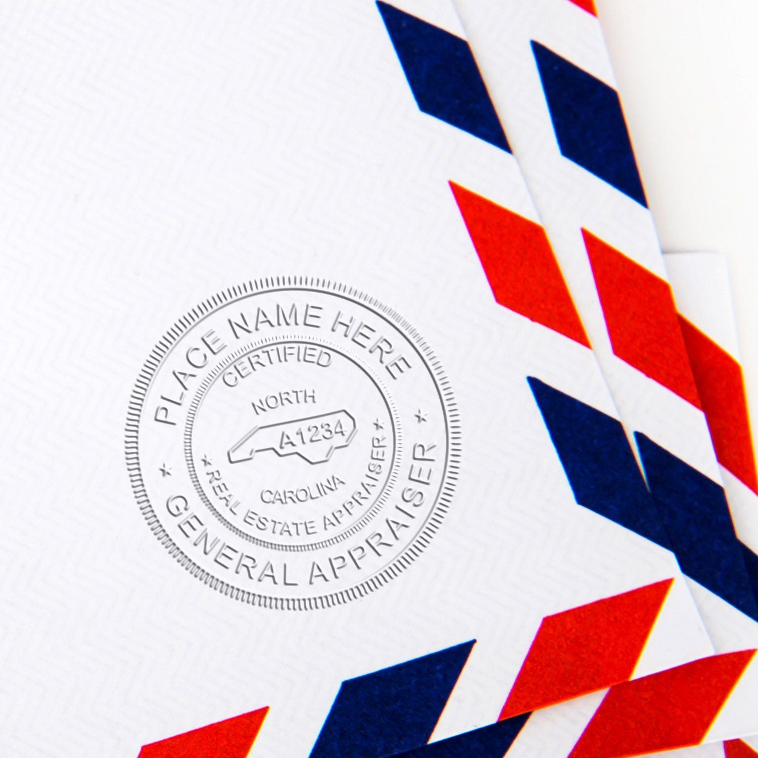 Certified General Appraiser seal on a North Carolina real estate appraisal envelope with red and blue airmail pattern.
