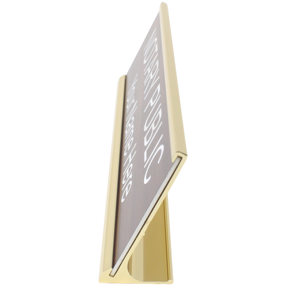 Modern vertical public sign on a beige display stand with typography text.