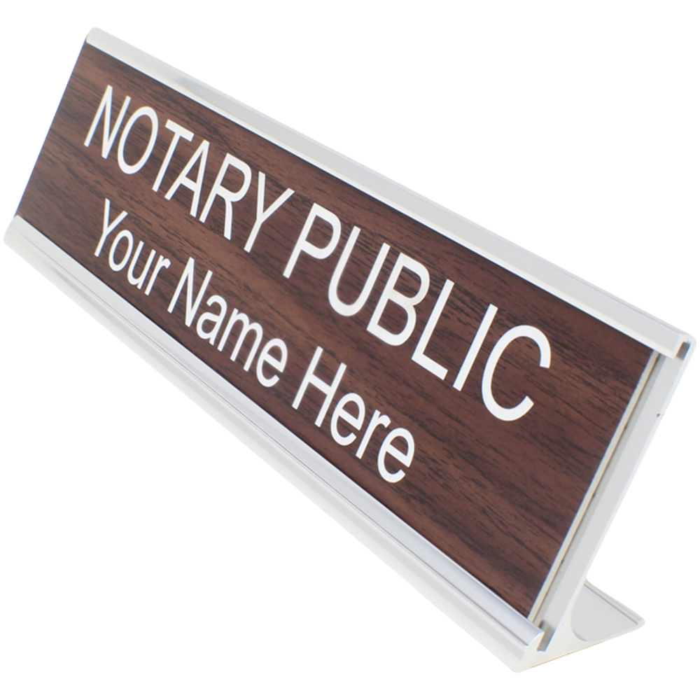 Notary public desk nameplate sign with custom name space on wood finish.