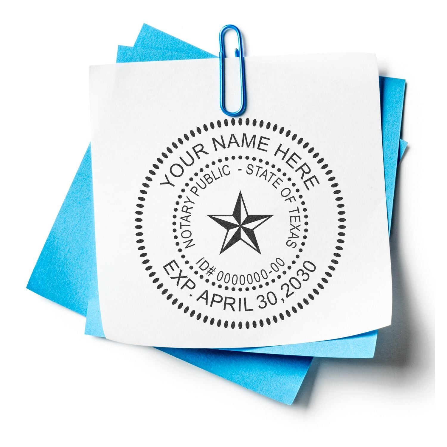 Texas notary public seal stamp on stacked blue and white paper notes with paperclip.