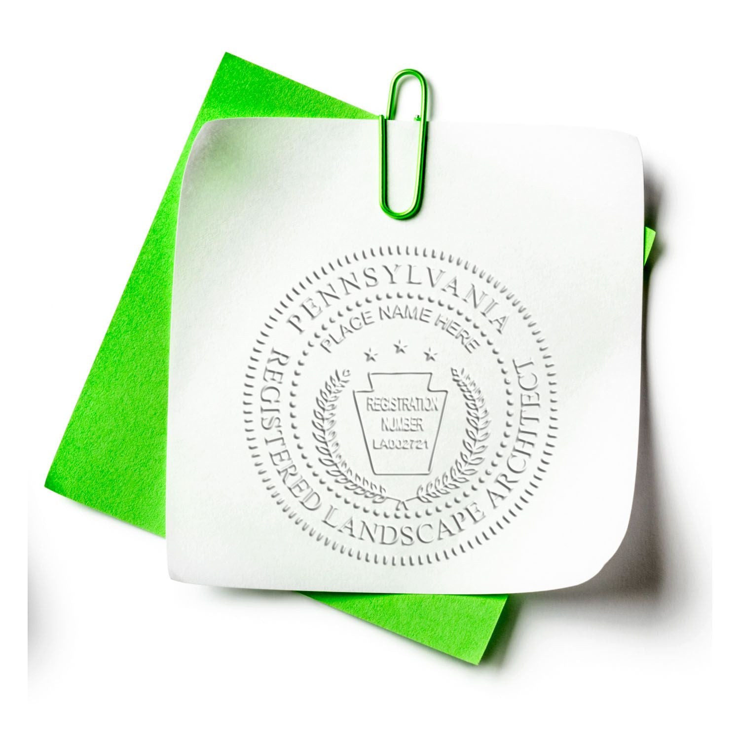 Pennsylvania Registered Landscape Architect embossed seal on white paper with green background and paperclip.