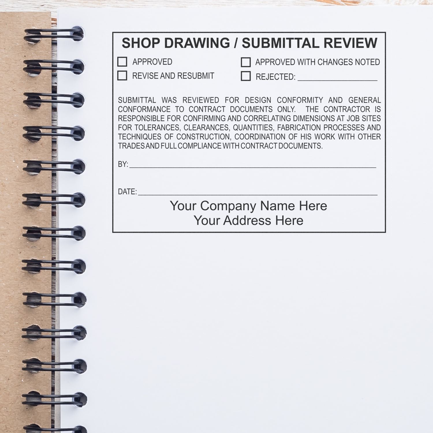 Spiral notebook page with shop drawing and submittal review form template, including approval checkboxes, signature line, date field, and company name and address placeholders.
