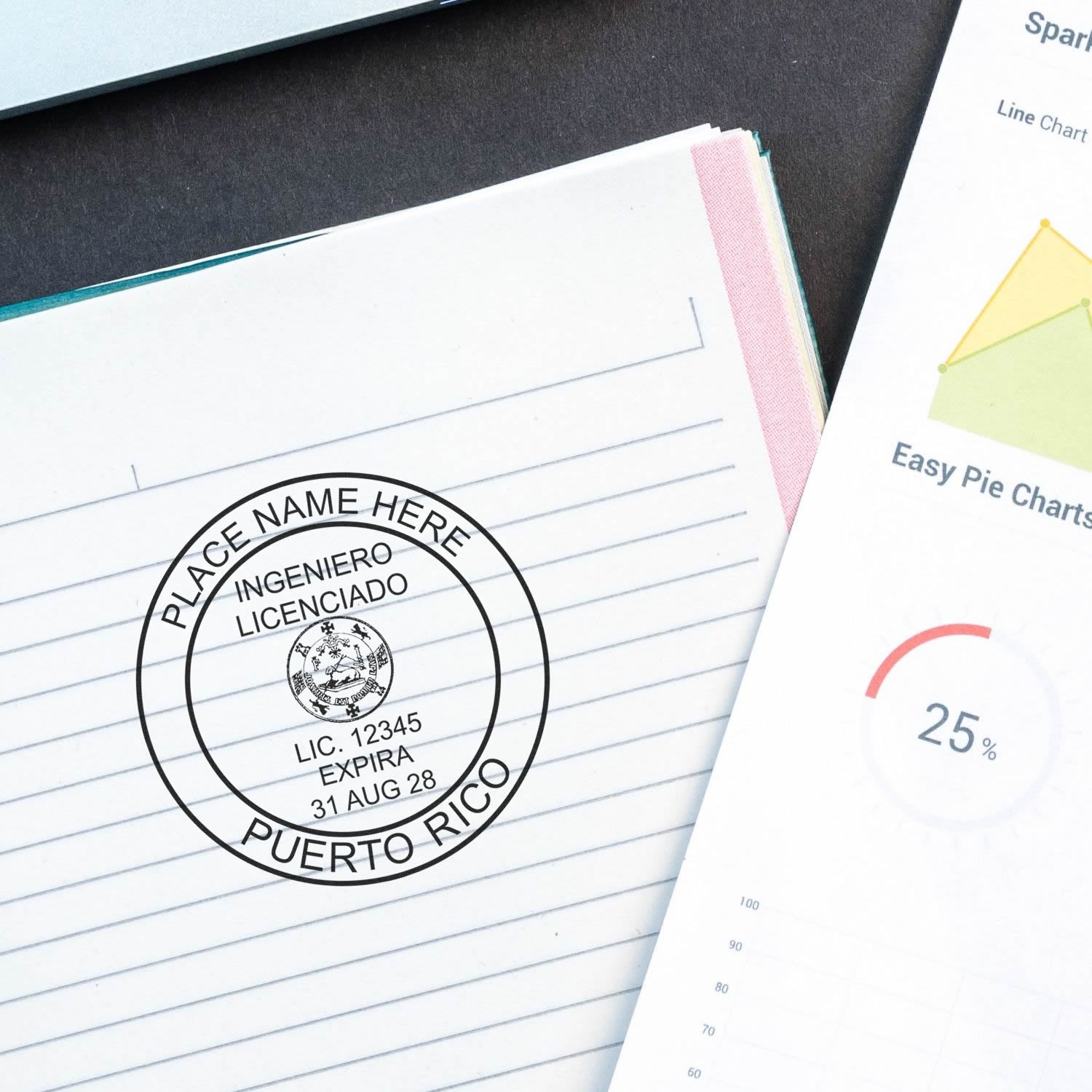 Close-up of a Puerto Rico engineer license stamp on lined paper beside a chart booklet, professional document verification and business analytics concept.