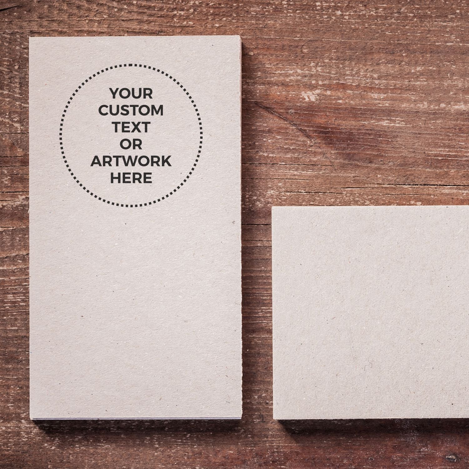 Custom text and artwork placement mockup on blank greeting cards over rustic wooden background for personalized printing.