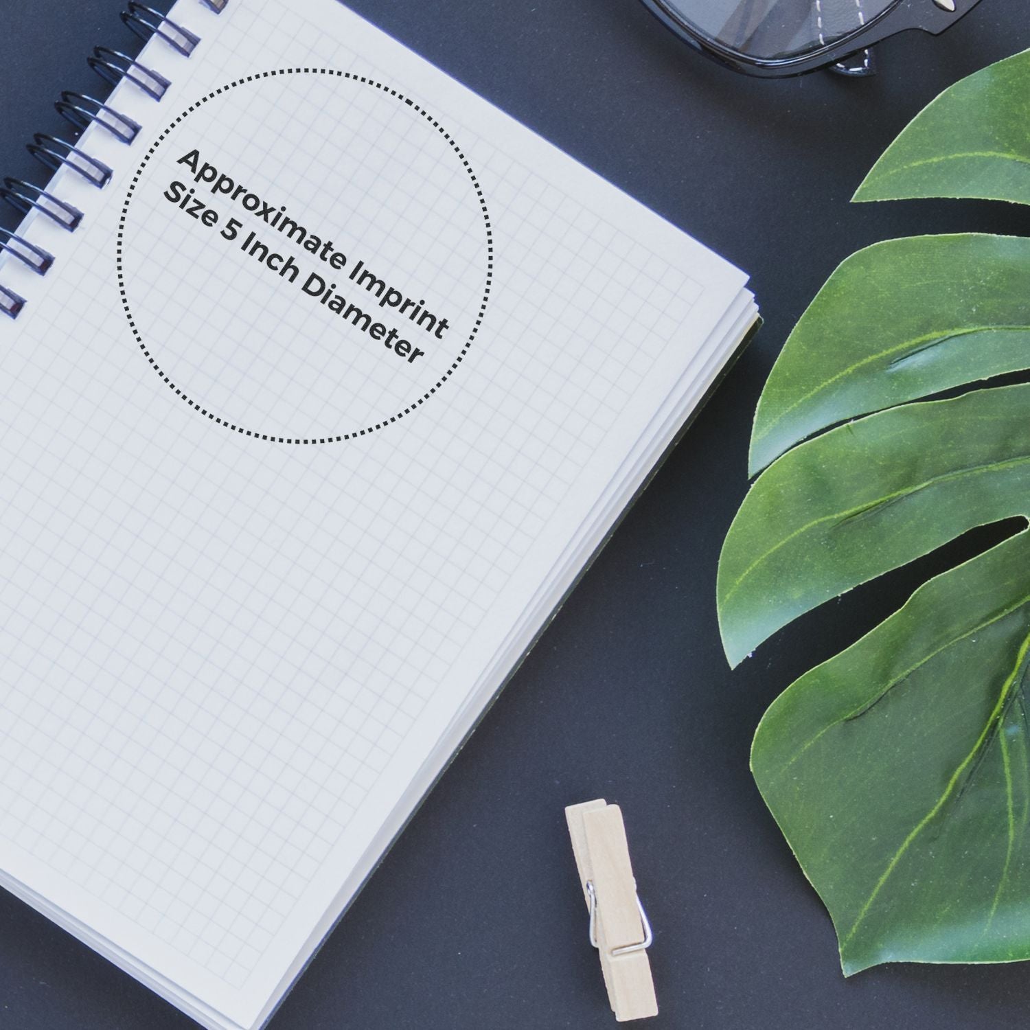 Notebook mockup showing approximate imprint size 5-inch diameter for logo placement and custom printing labeling template.