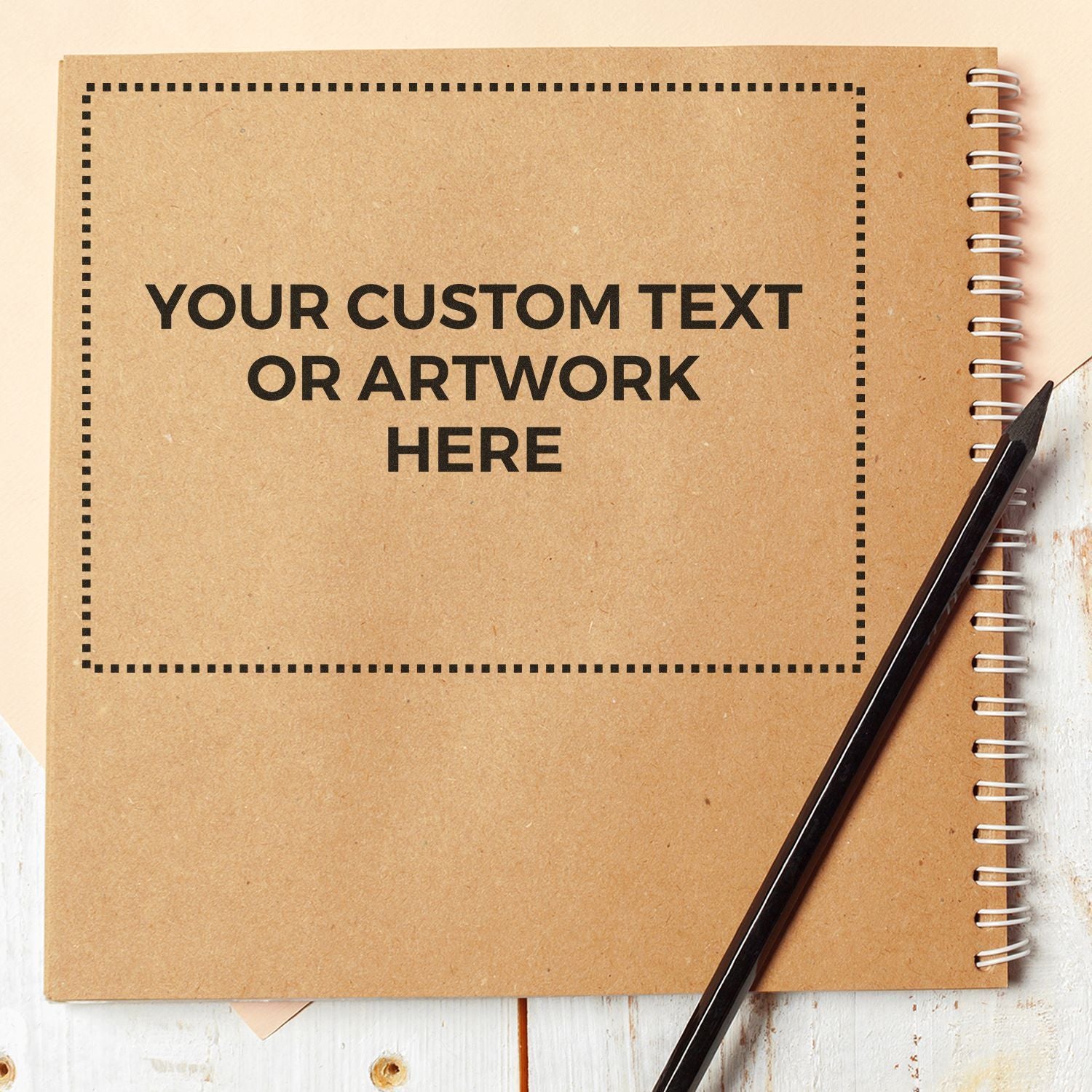 Customizable kraft notebook cover template with placeholder text for your custom text or artwork, plus pencil for design mockups.