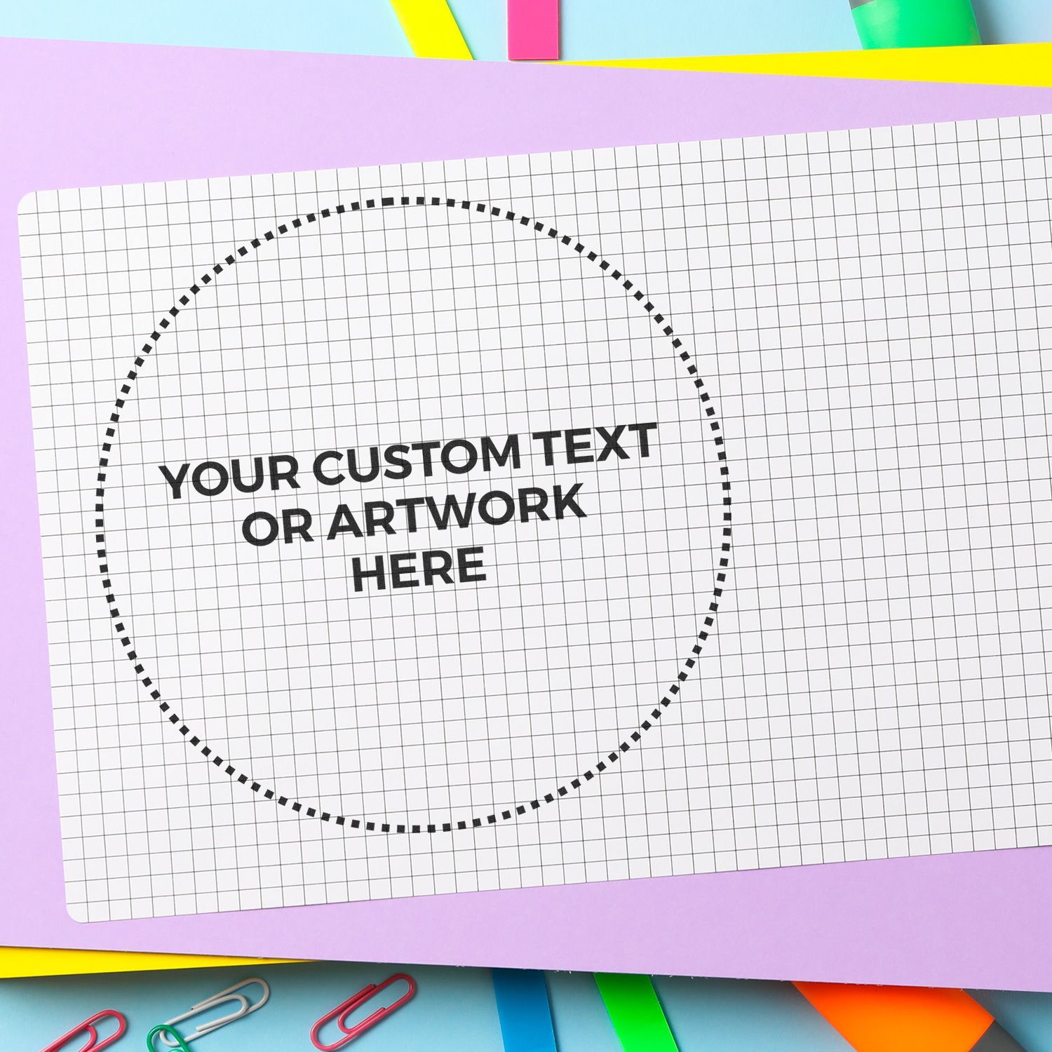 Notebook grid paper design template with dashed circle placeholder text: YOUR CUSTOM TEXT OR ARTWORK HERE for custom artwork placement.