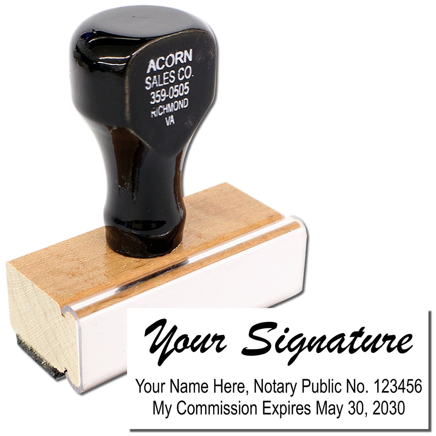 Custom notary signature stamp with personalized name, notary public number, and commission expiration date on a wooden handle seal.