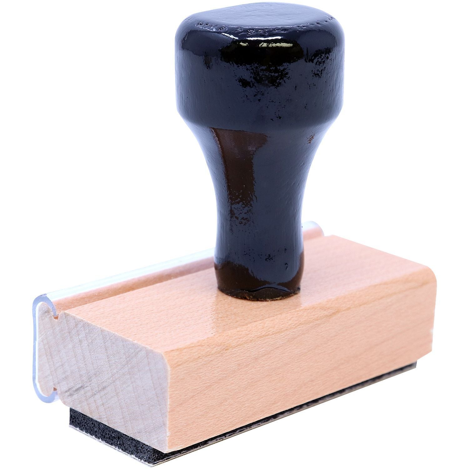 Close-up of a wooden rubber stamp with black handle on a white background.