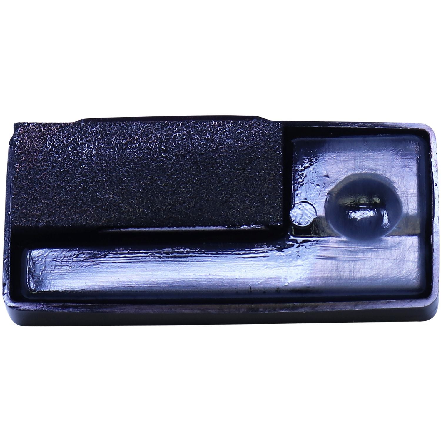 Black rubber mounting bracket with textured grip pad and recessed circular hole on a white background