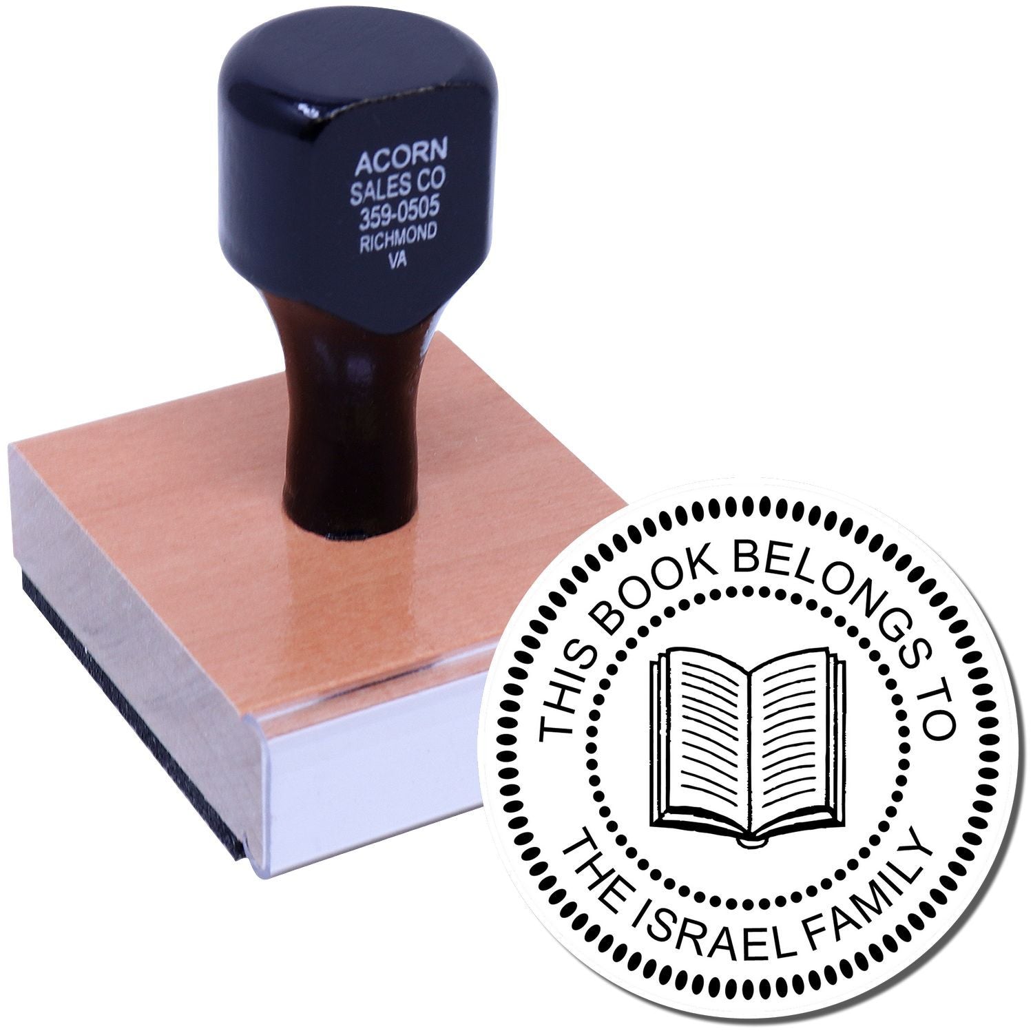 Personalized rubber library stamp with custom This Book Belongs To The Israel Family design for books and collections.