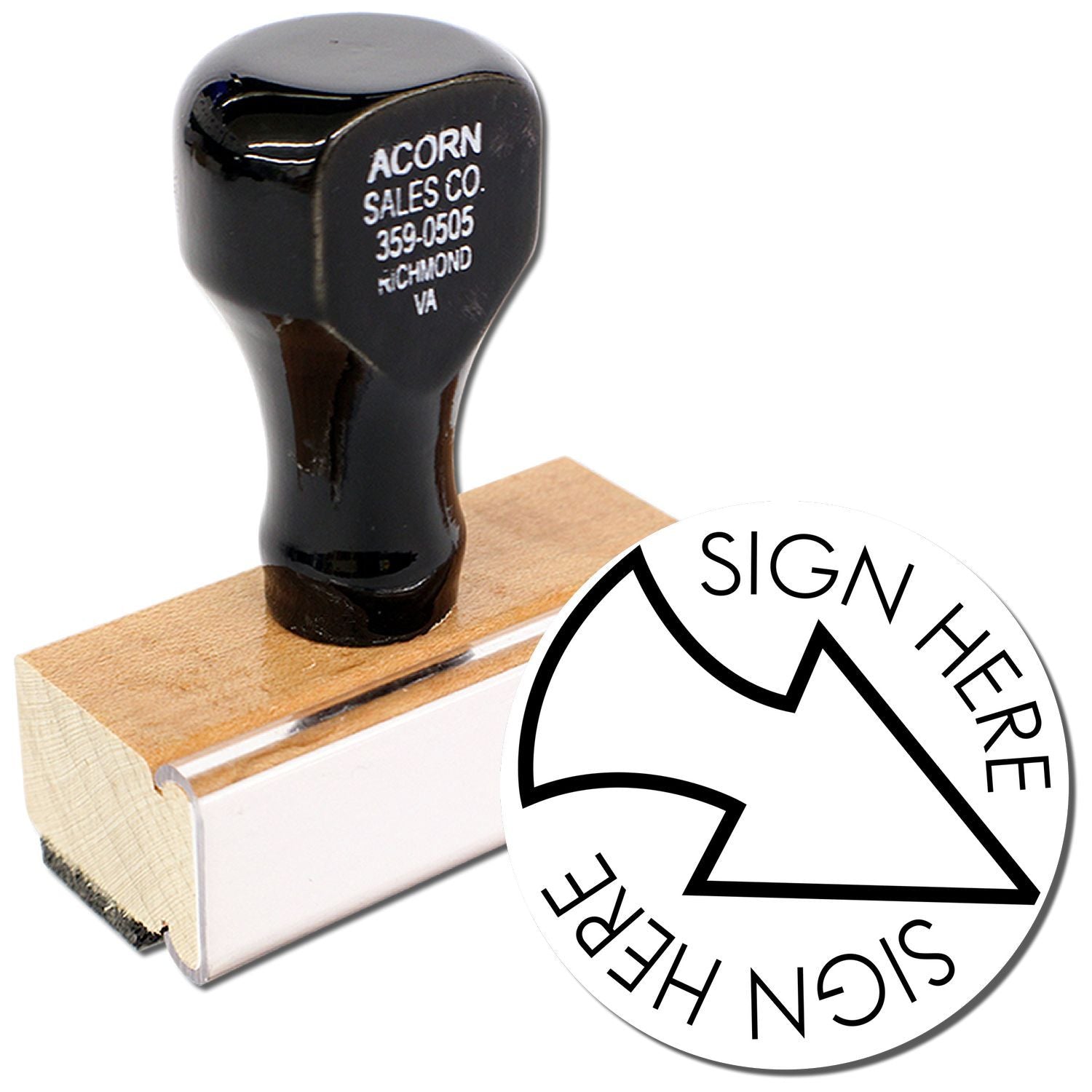 Custom self-inking Sign Here stamp with black handle and wooden base for office documents and contracts.
