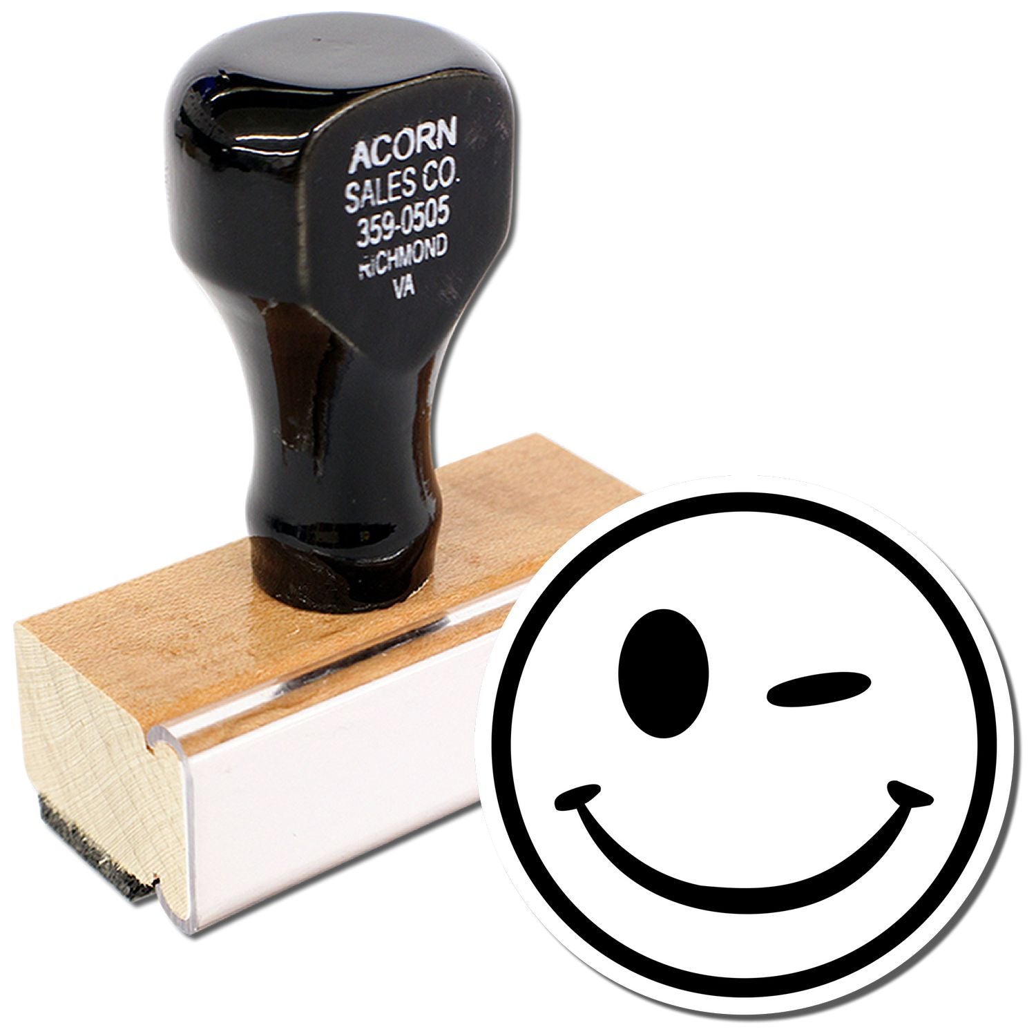 Black custom rubber stamp with smiley face design on wooden base, office stationery tool.