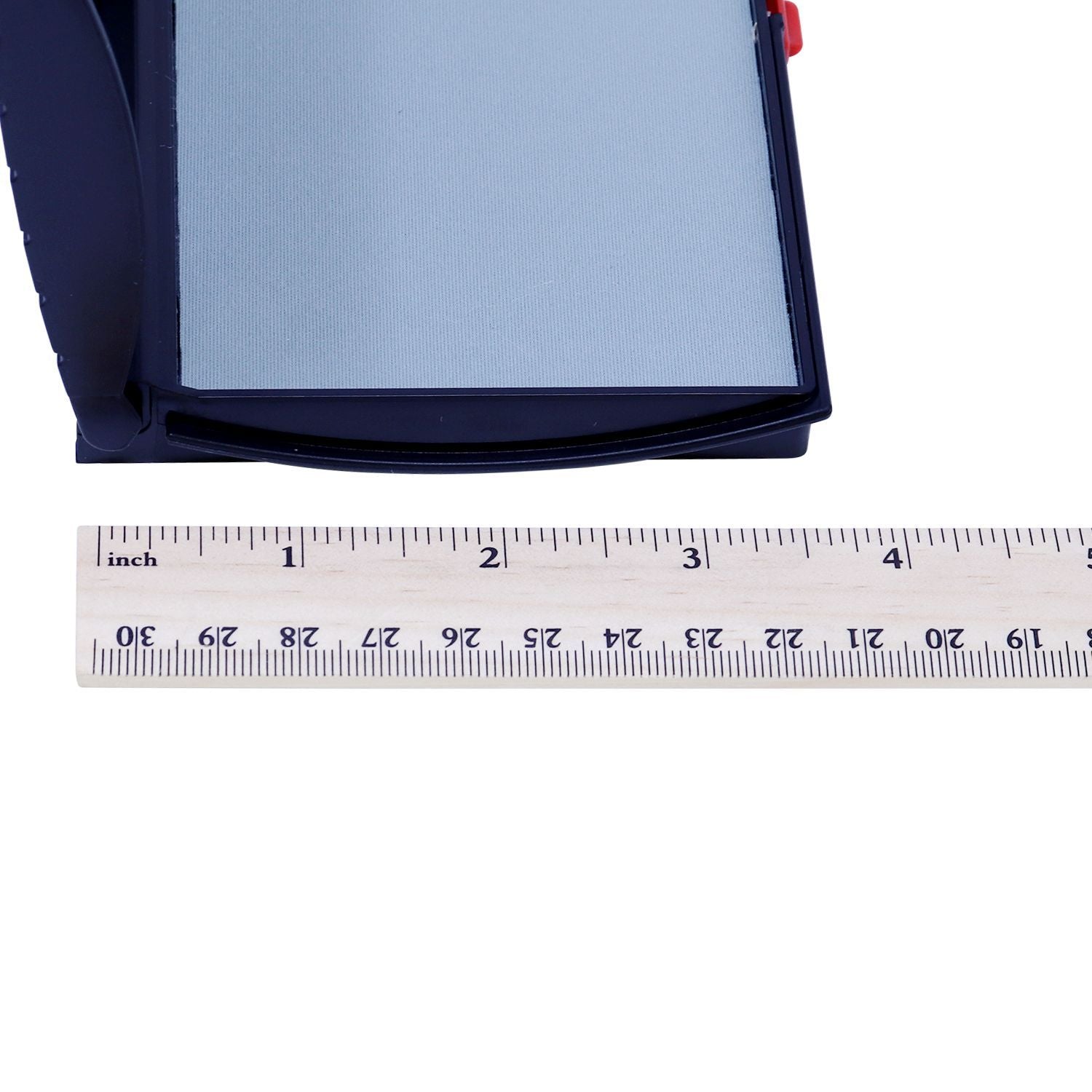 Close-up of a black mesh zippered storage case with ruler for size reference.