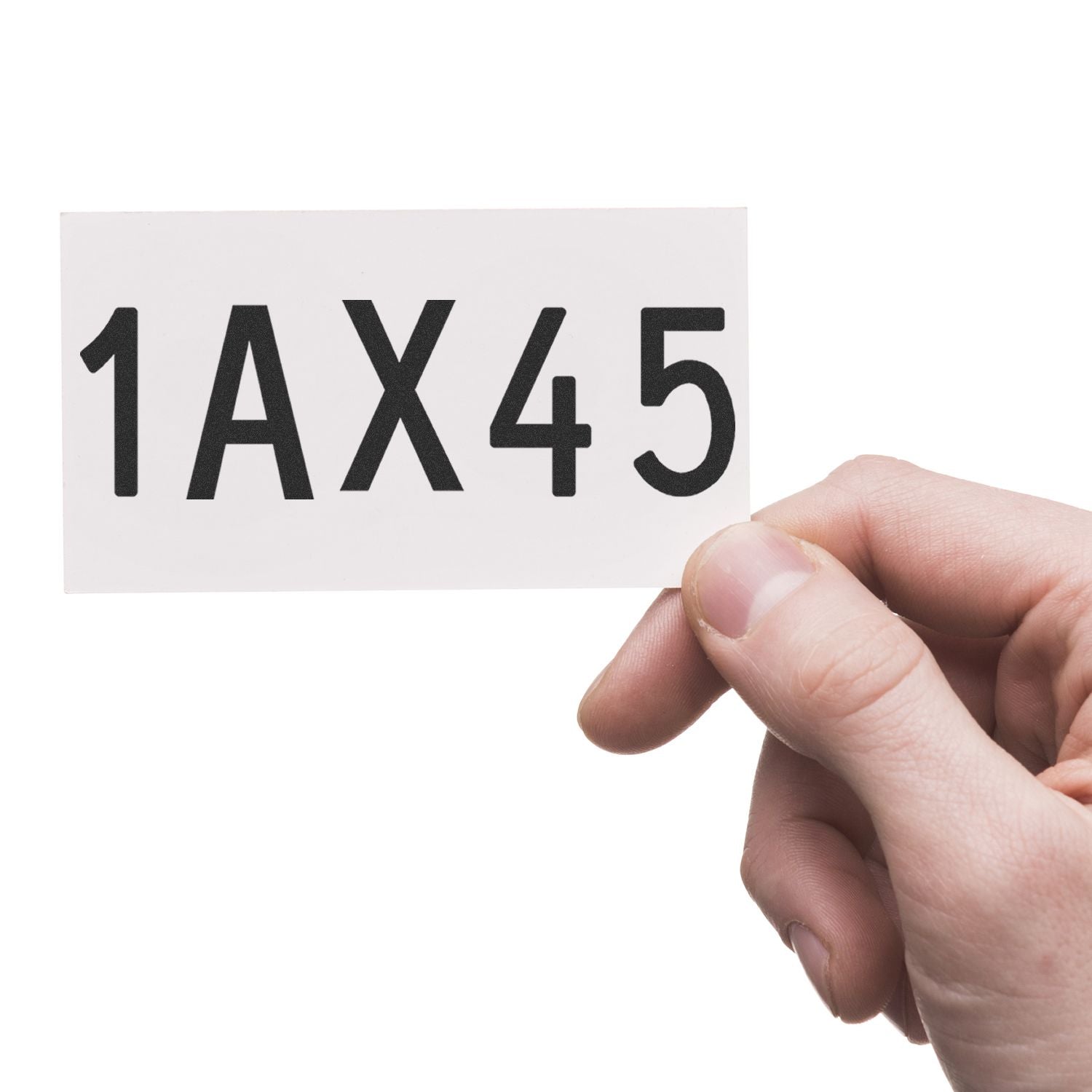 Hand holding a white card with black alphanumeric code 1AX45 on a clean white background.
