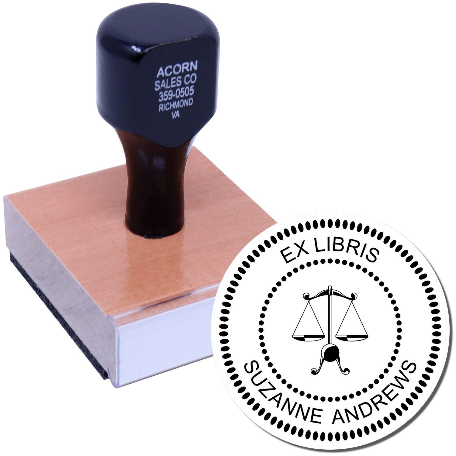 Custom rubber stamp for personalized ex libris bookplates, featuring a scales of justice design for Suzanne Andrews.