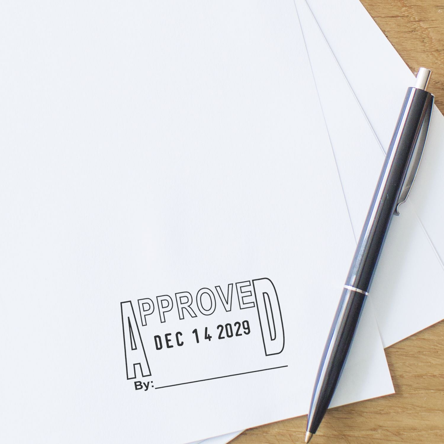 Approved business document with a pen on a white desk, stamped APPROVED with date Dec 14 2029.