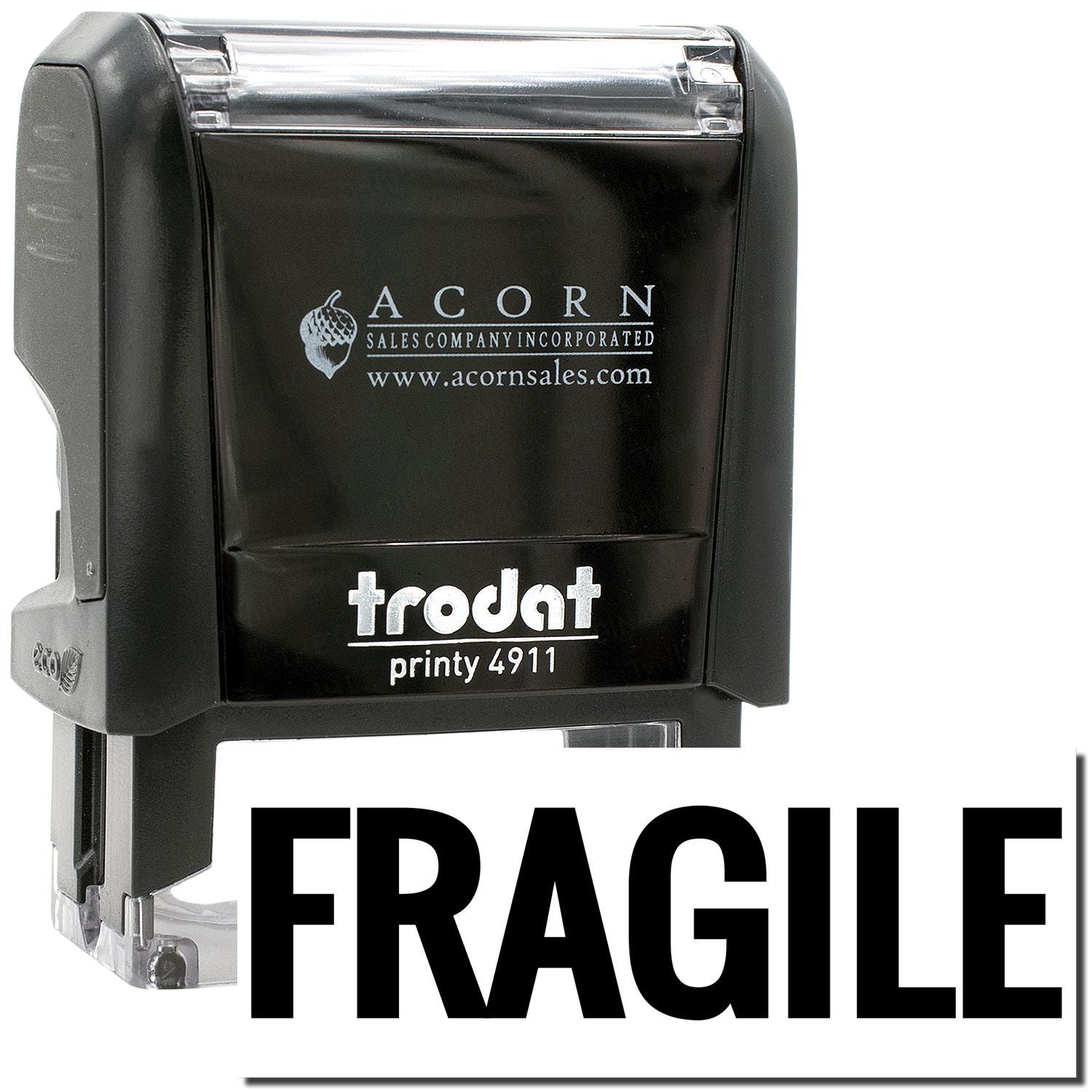 Black Trodat Printy 4911 self-inking stamp with FRAGILE imprint, Acorn Sales Company logo, isolated on white background