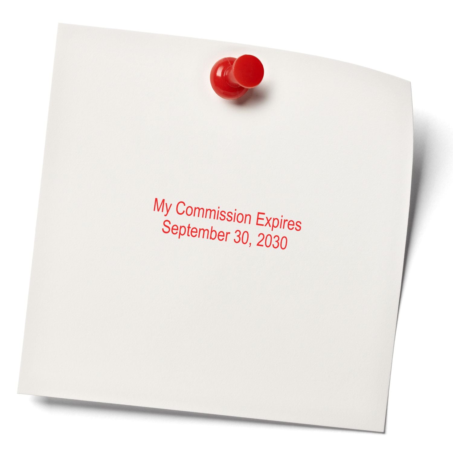 Pinned note reading My Commission Expires September 30, 2030 with a red pushpin on white paper.