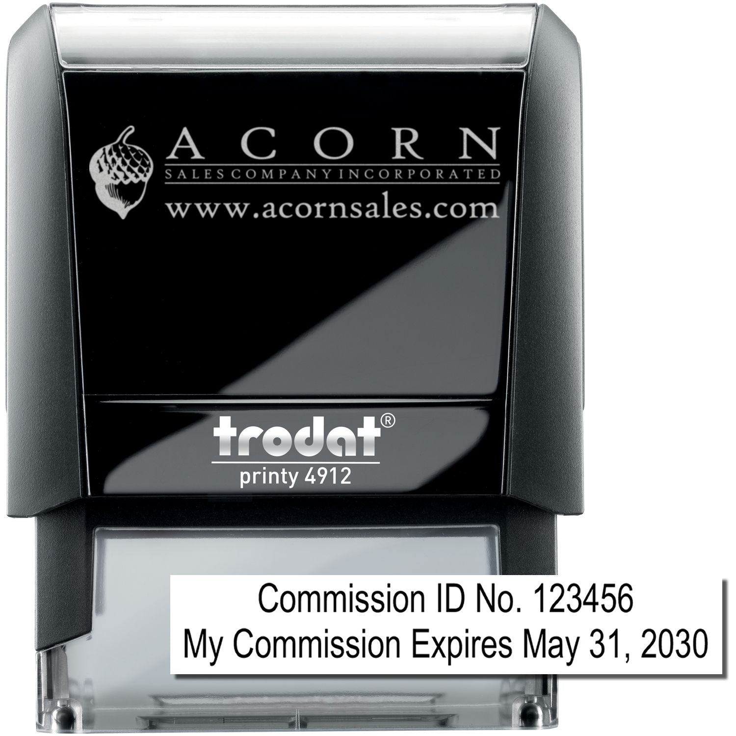 Custom Trodat Printy 4912 self-inking commission stamp with Acorn Sales Company logo and commission ID number.