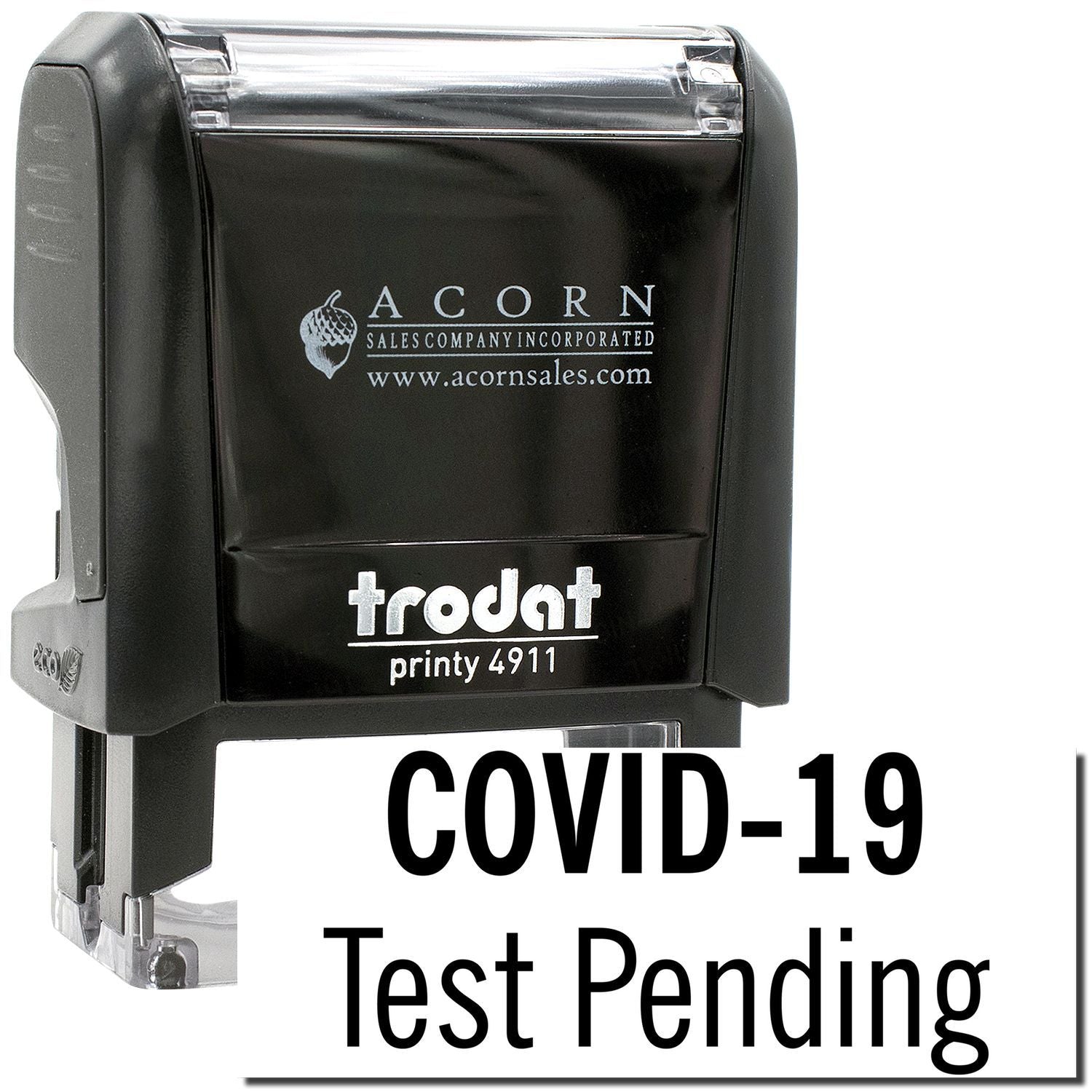 Black Trodat Printy 4911 self-inking stamp showing COVID-19 Test Pending text on white background.