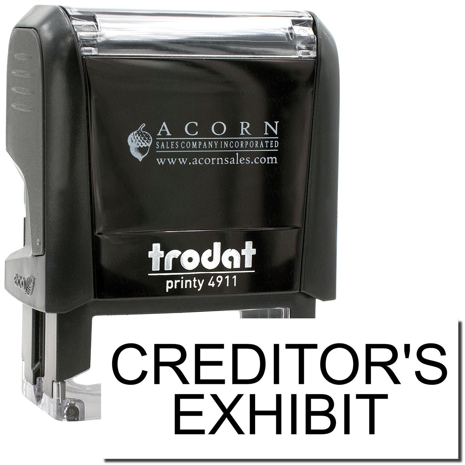 Black Trodat Printy 4911 self-inking stamp with Creditors Exhibit text, Acorn Sales Company logo, and clear handle design