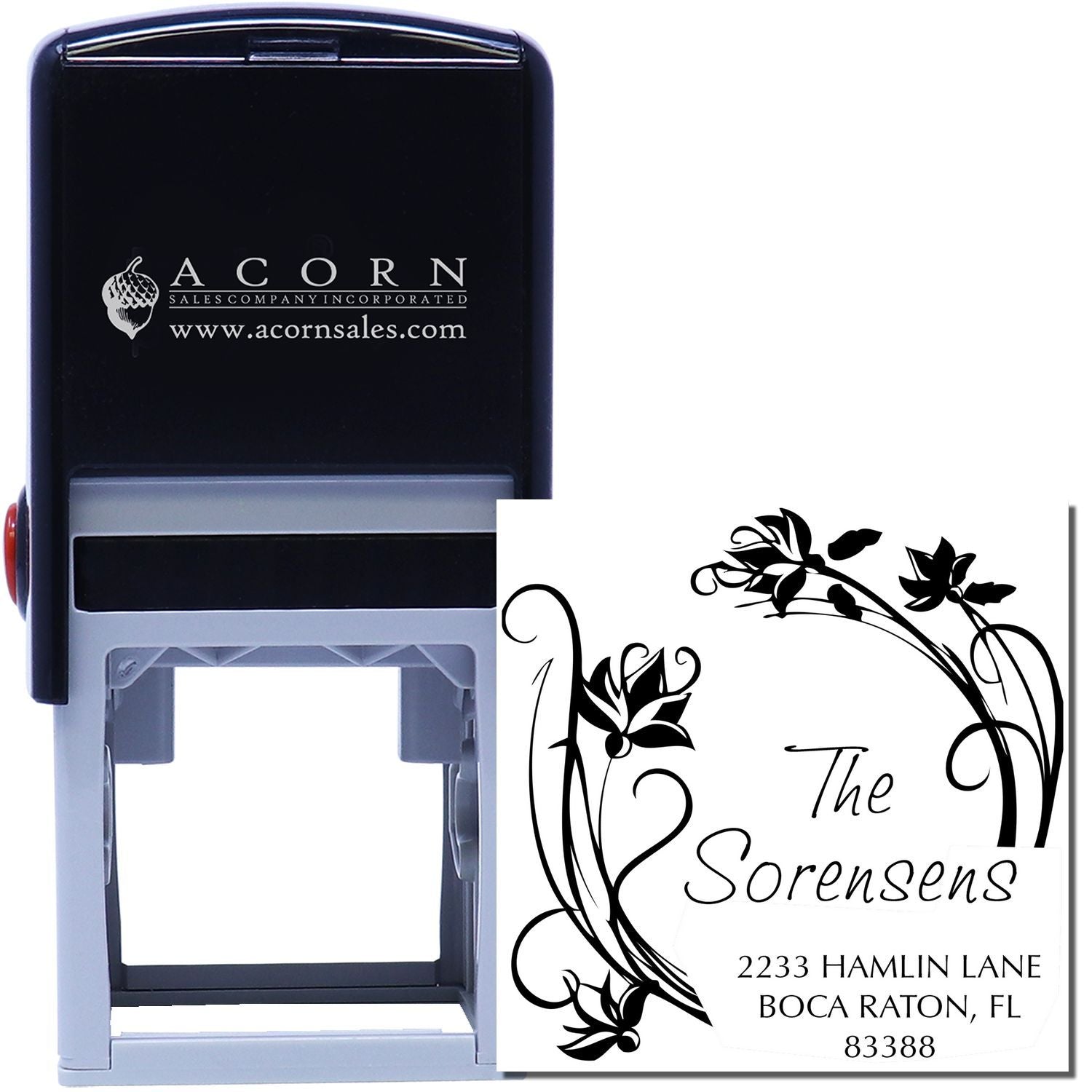 Custom self-inking rubber address stamp with floral monogram design for personalized mailing labels and stationery.