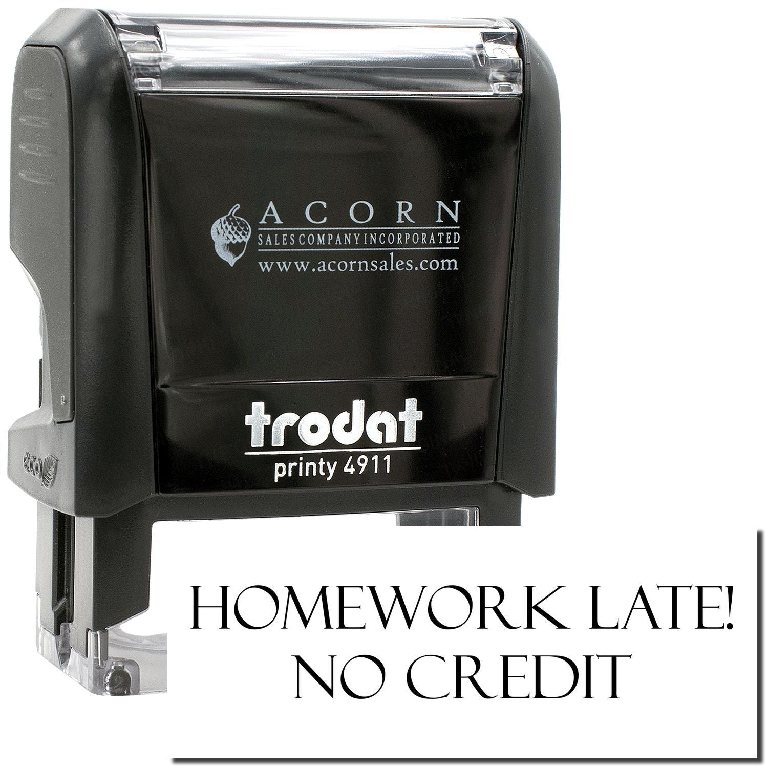 Black Trodat Printy 4911 self-inking stamp with Homework Late! No Credit imprint and Acorn Sales branding.