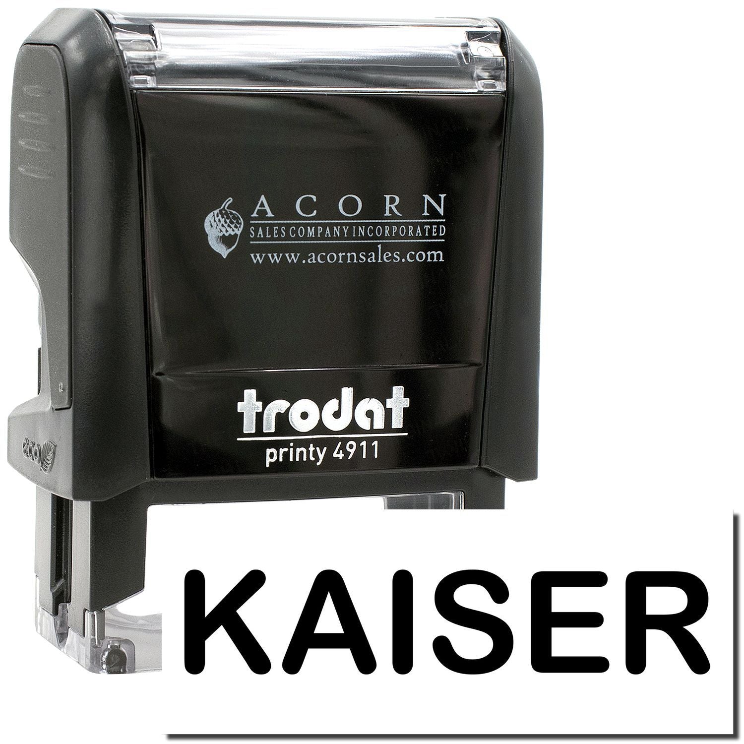 Black Trodat Printy 4911 self-inking stamp with Kaiser text, Acorn Sales logo, and clear handle casing.