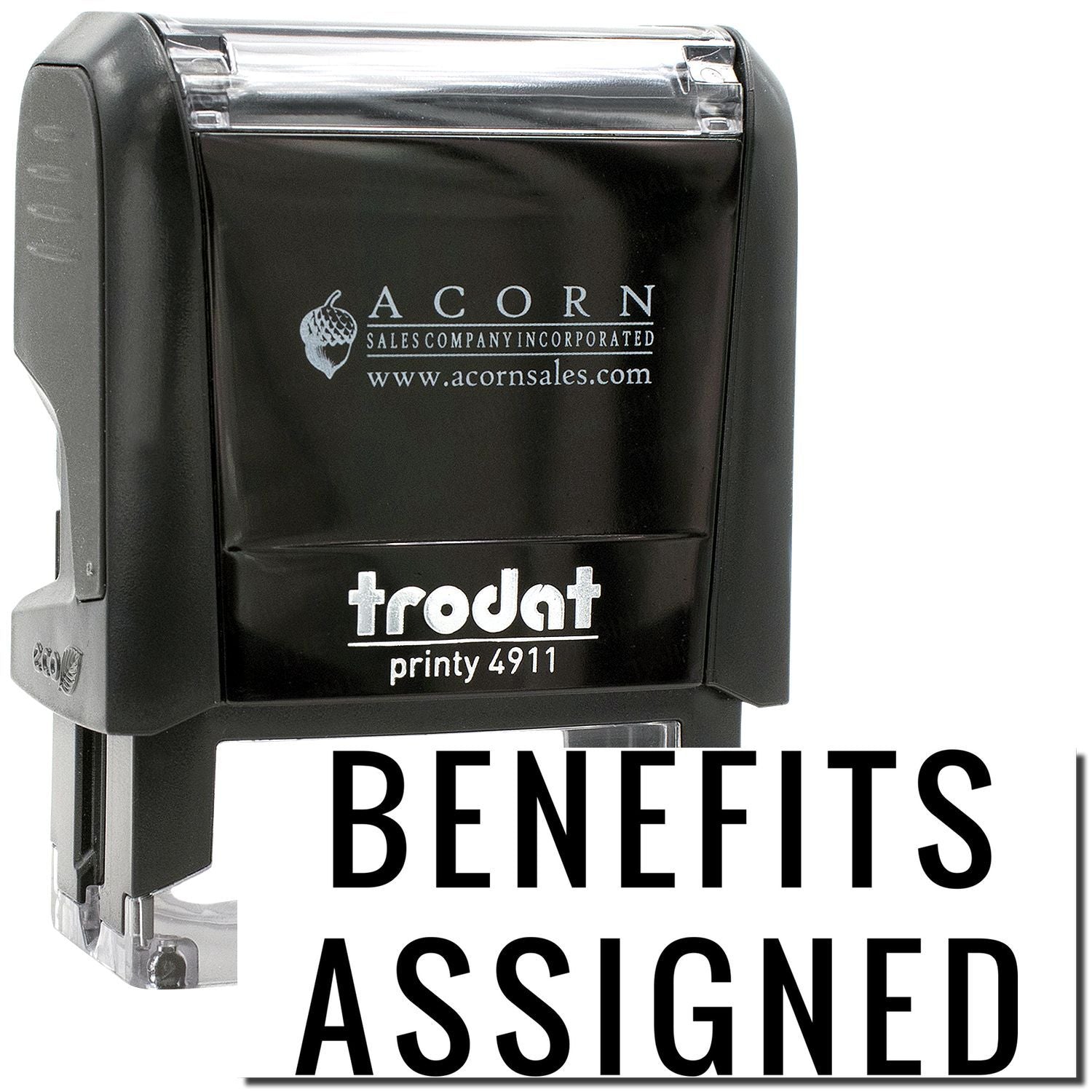 Trodat Printy 4911 self-inking stamp with Benefits Assigned text, Acorn Sales black rubber stamp on white background