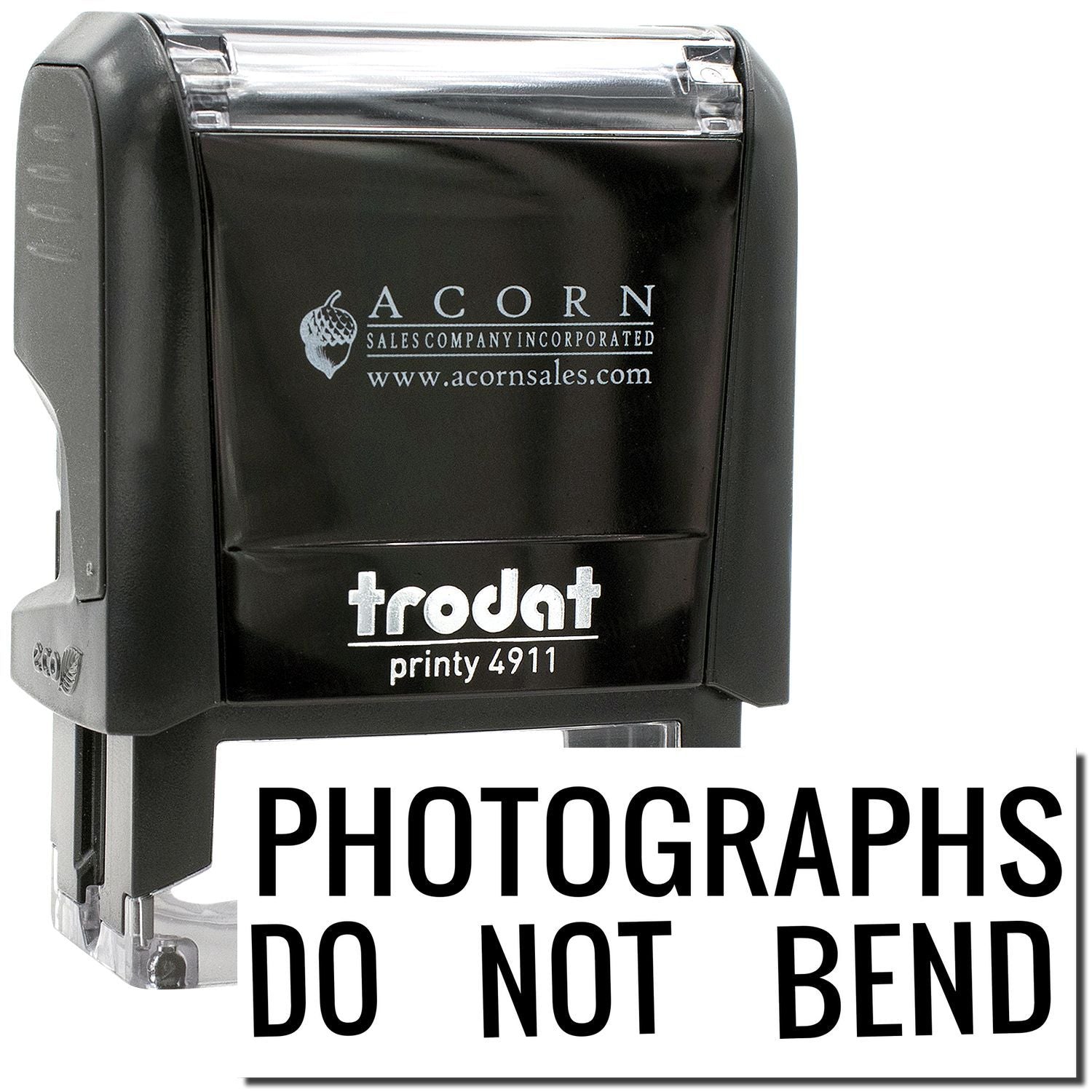 Black Acorn Trodat Printy 4911 self-inking stamp with Photographs Do Not Bend imprint.