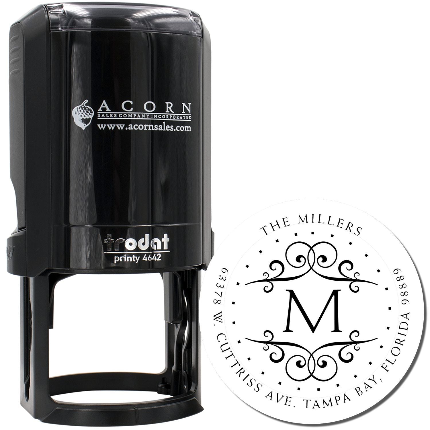Self-inking custom rubber stamp with monogram address design for personalized wedding or business mailing.