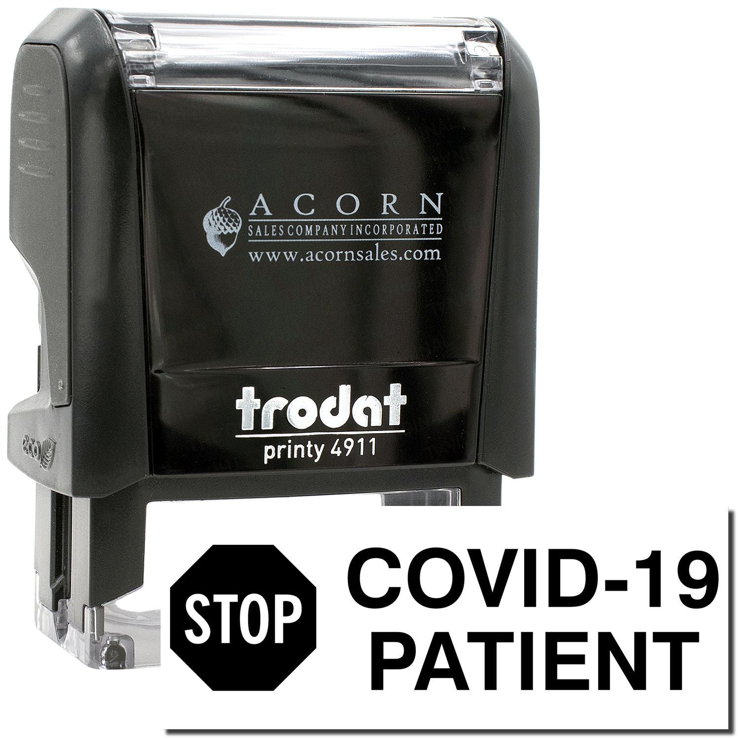 Black Trodat self-inking stamp with STOP COVID-19 PATIENT message, Acorn Sales logo, and clear handle detail on white background