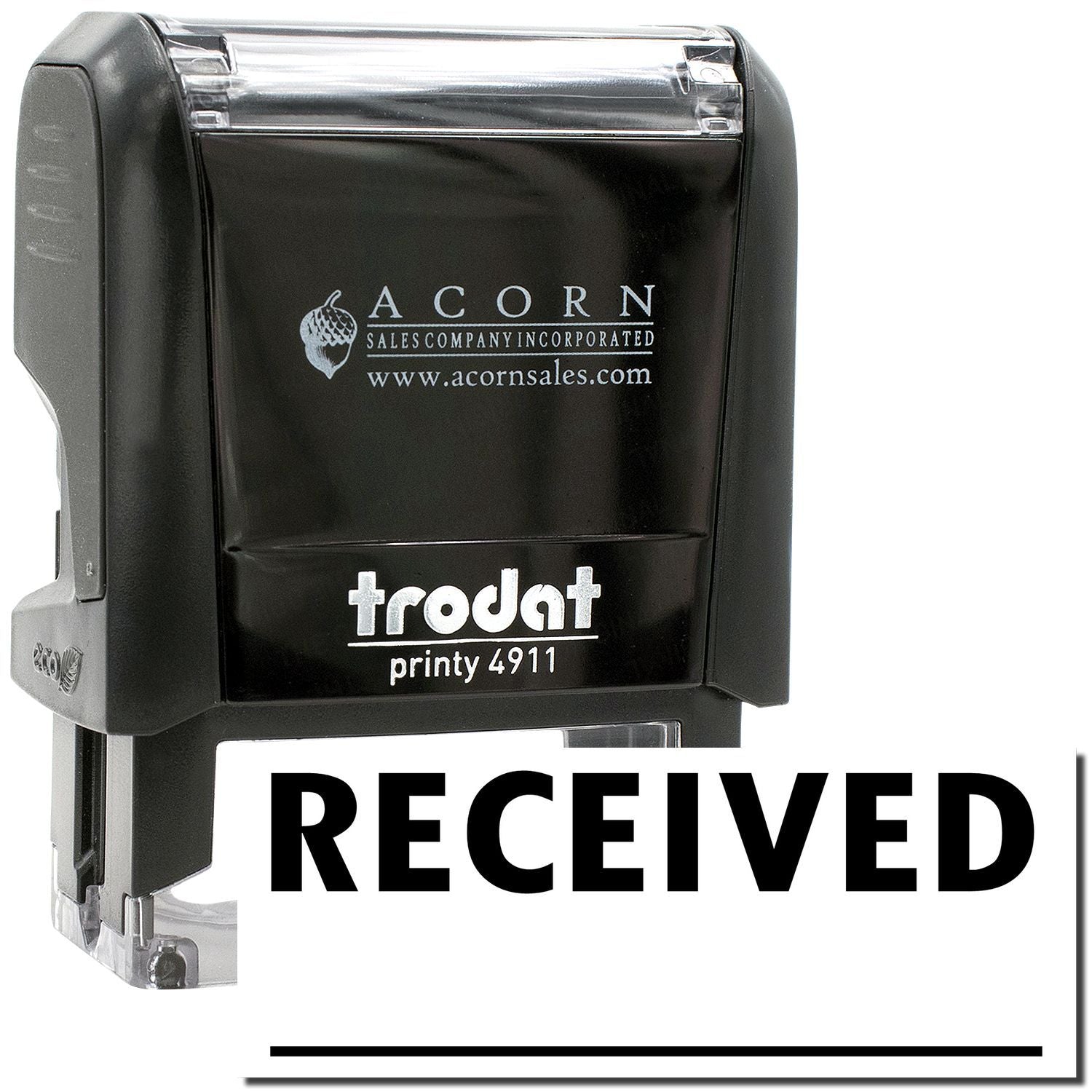 Black Trodat Printy 4911 self-inking RECEIVED date stamp for office document processing
