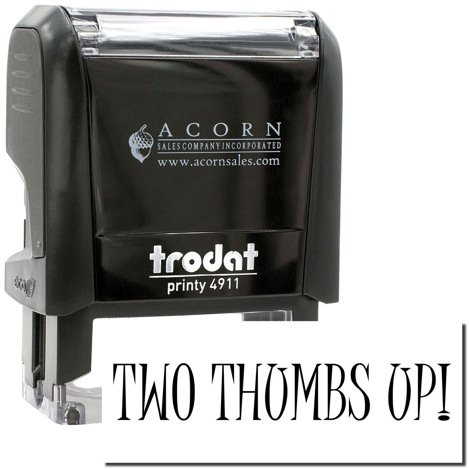 Black Trodat Printy 4911 self-inking stamp with Two Thumbs Up! imprint, close-up view.