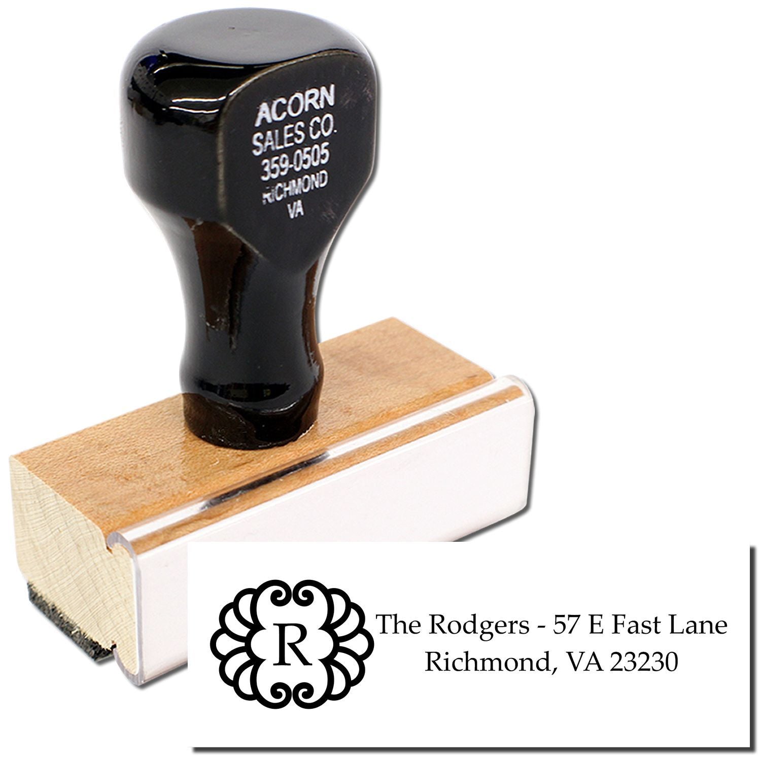 Personalized address rubber stamp with monogram and return address for envelopes and stationery.