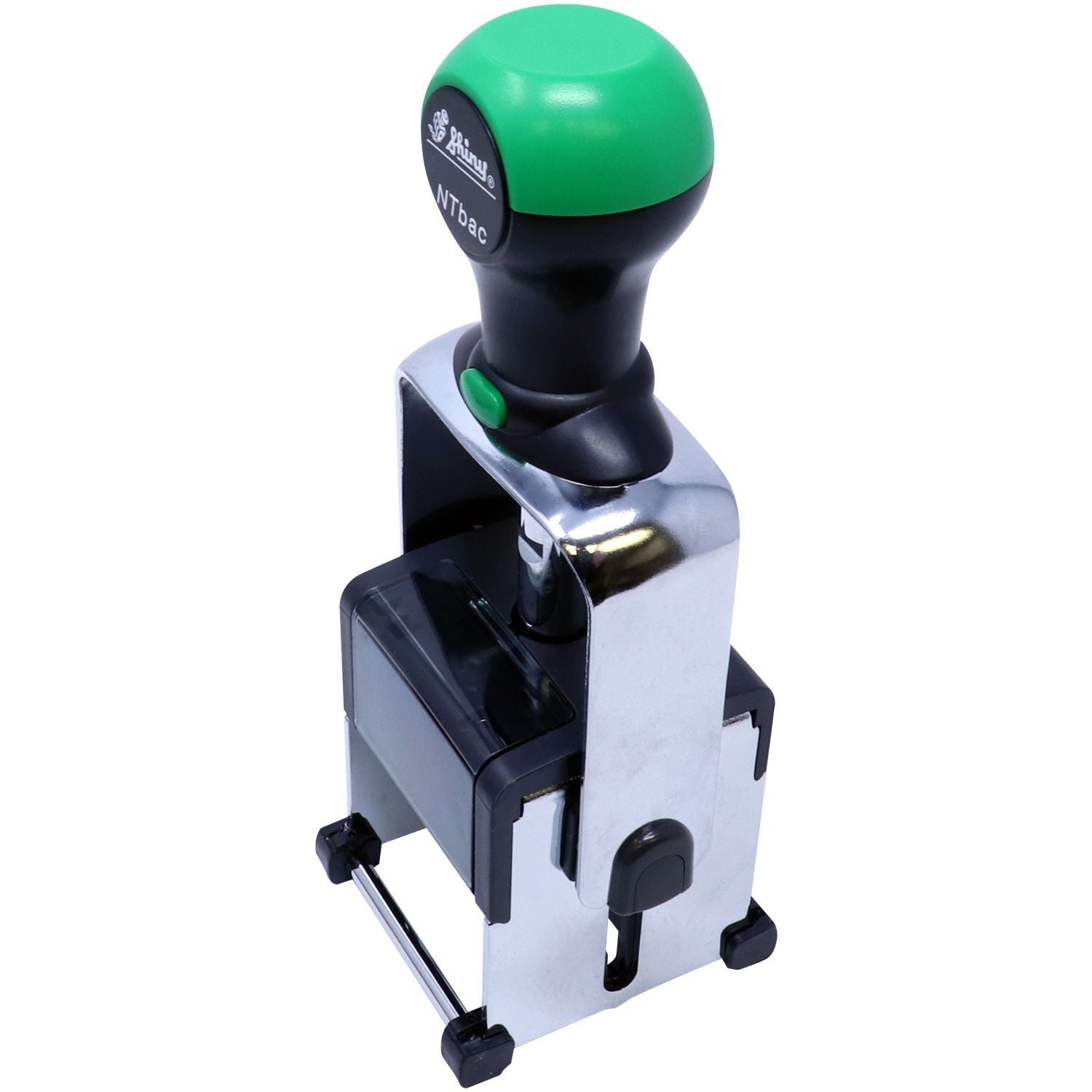 Self-inking rubber stamp with green handle and metal frame on white background