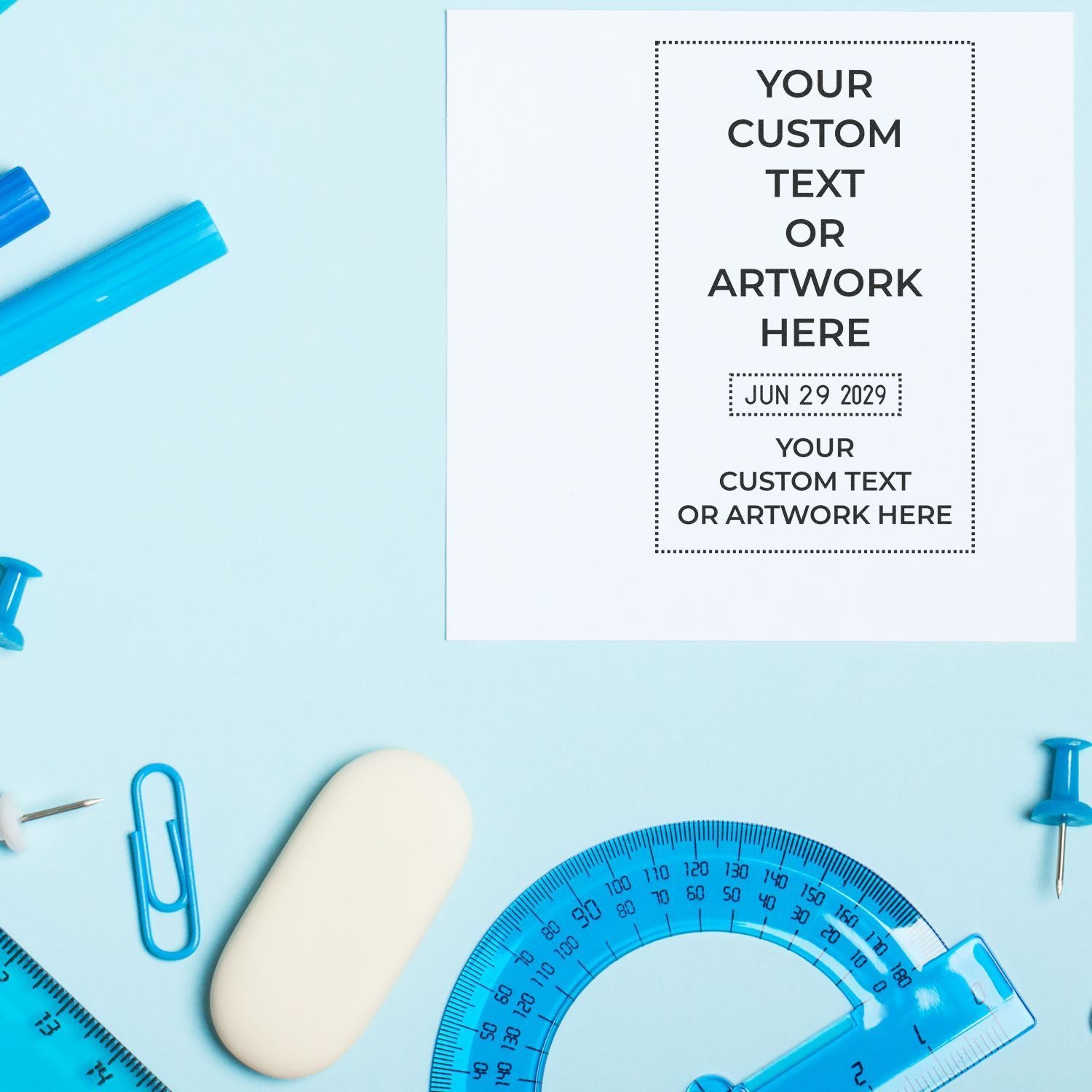 Minimalist back to school mockup with custom text poster, blue school supplies, ruler, protractor, paper clips, and push pins on a light blue background.