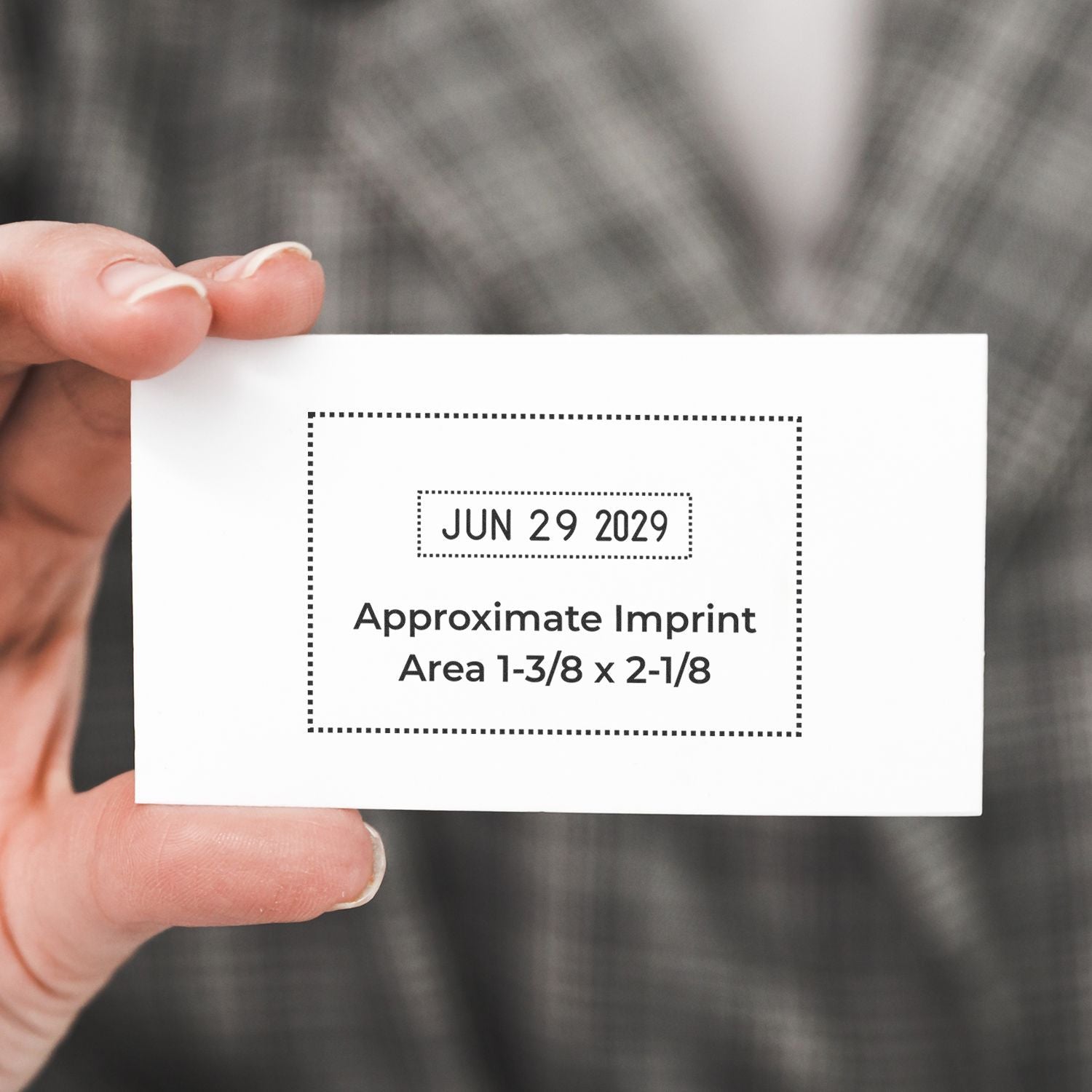 Hand holding a business card mockup with June 29, 2029 date and approximate imprint area template.