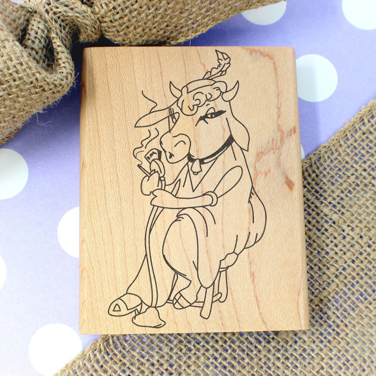 Laser engraved wooden cow art plaque with rustic boho decor and whimsical line drawing illustration.
