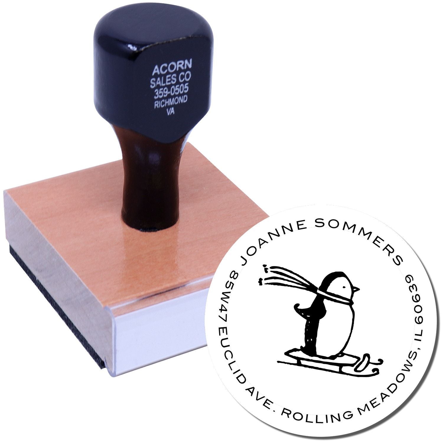 Custom wooden rubber stamp with penguin logo and address imprint, ideal for business branding, mailing, and office use.