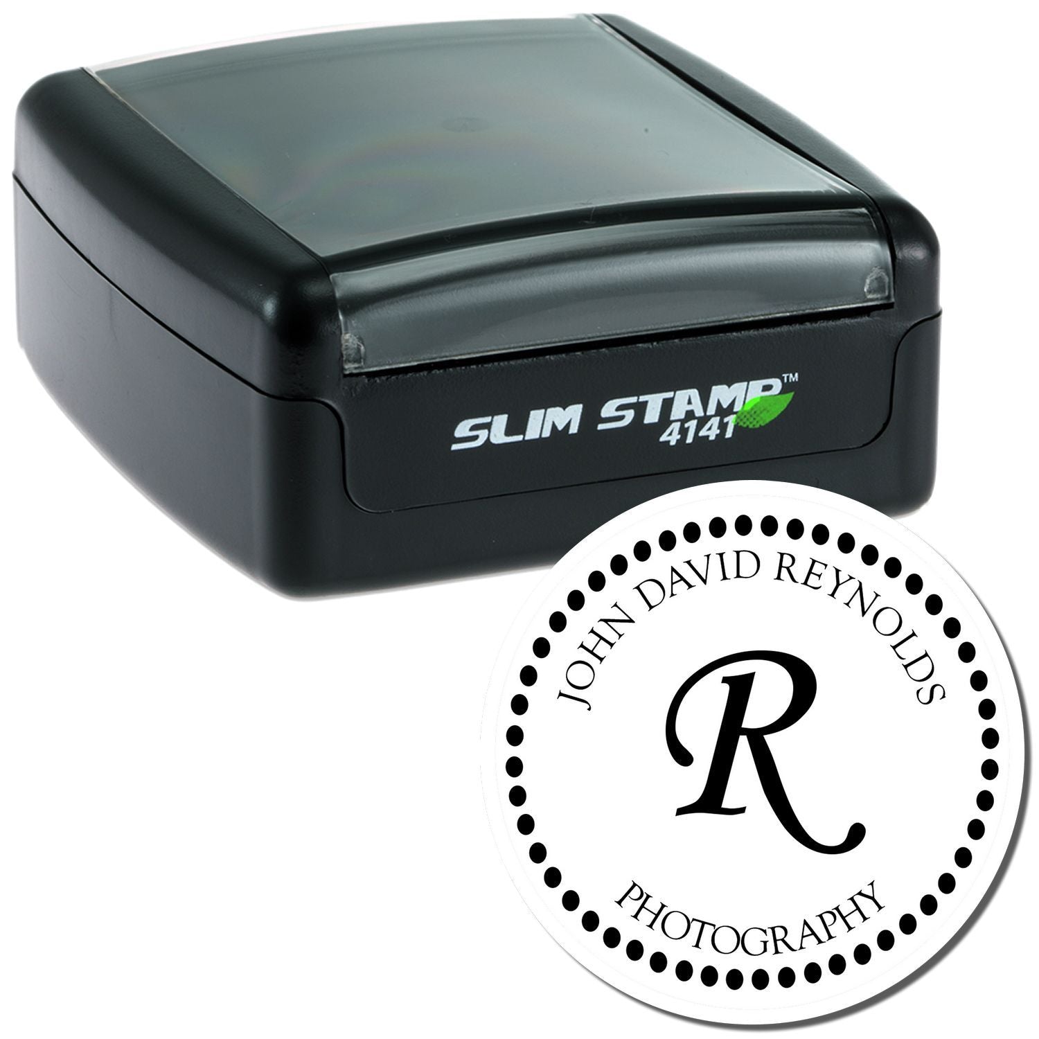Self-inking rubber stamp with custom monogram logo imprint for personalized business, photography, or branding use.