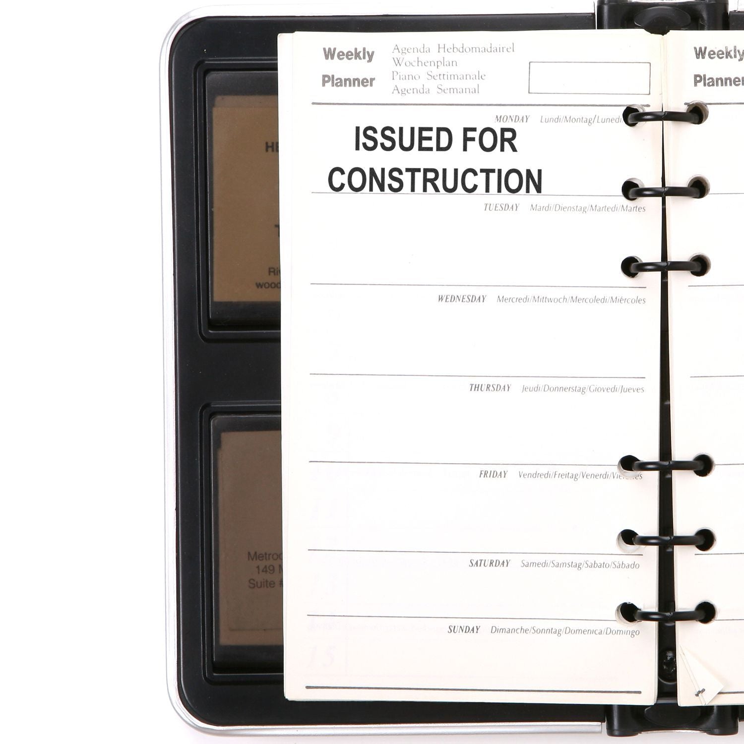 Weekly planner binder page labeled Issued for Construction on a black clipboard or tablet case.